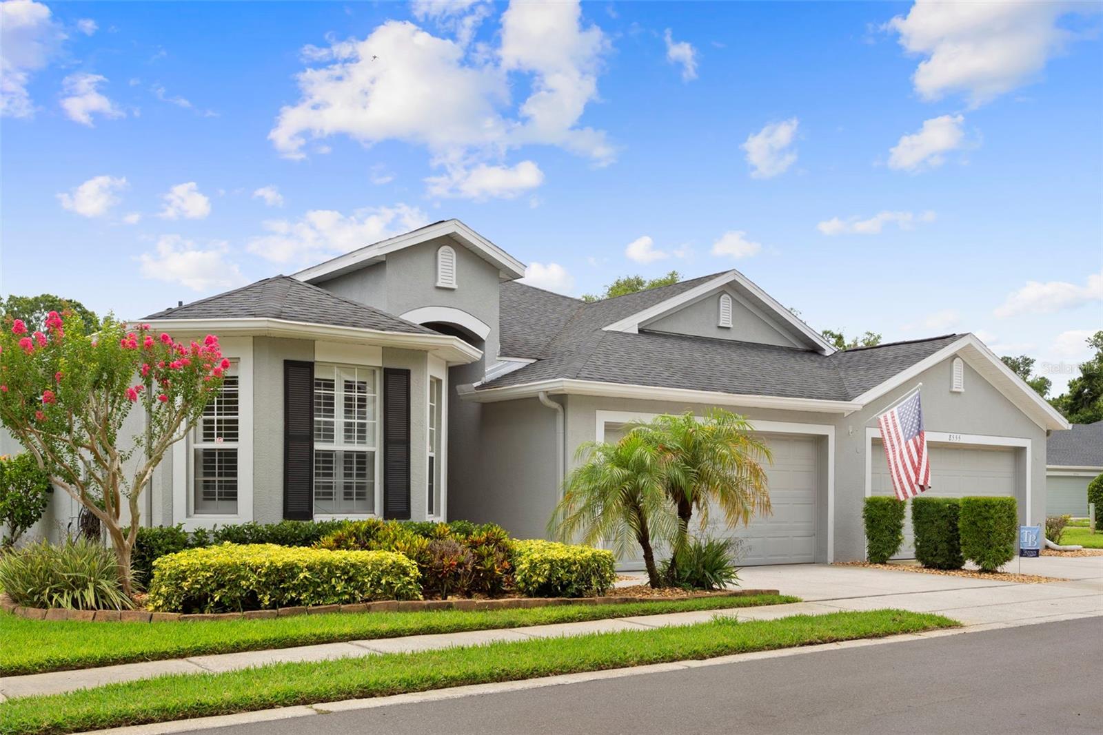 This home exudes pride in ownership! Beautifully maintained 2 bed, 2 bath VILLA with separate enclosed office, generous flex space (currently a formal dining room), 2 car garage and a large fully screened in patio now available in lovely tree-lined, gated Westchase area neighborhood of WESTMONT OAKS.  Located within a stone’s throw of dining, grocery shopping and other retail options, this is a well-suited for those seeking ideal proximity for life’s conveniences and travelers alike as the Tampa International Airport is a quick 15/20 minute drive.  Homeowner has taken care to update appliances as needed and just recently installed all new Luxury vinyl plank flooring throughout the entire home.  Plantation shutters accessorize the front bedroom.  Floor plan is very comfortable with nice separation between primary suite and second bedroom (privately set with a hallway that includes second bathroom and laundry room). Westmont Oaks HOA is well-managed and funded, covering grounds maintenance, exterior maintenance of home, and roof, as well as community gate and pool.  Known to be so friendly with planned neighborhood gatherings and events, it is a great place to land and call HOME from day one!