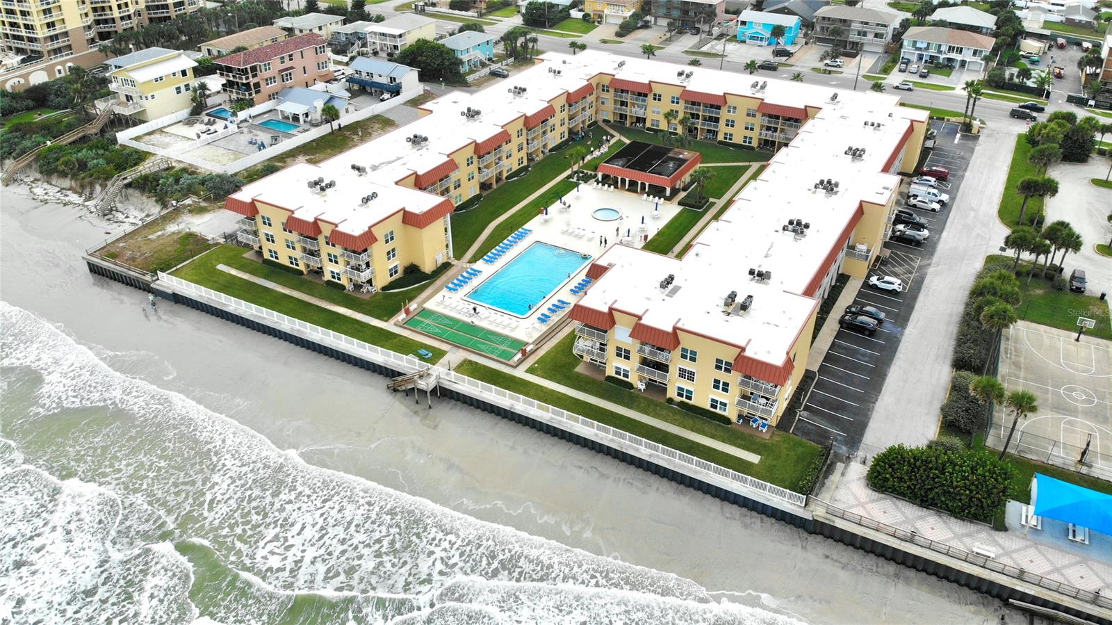 Enjoy the Sights & Sounds of New Smyrna Beach from this Beautiful, Oceanview 2 Bed, 2 Bath Condo at Point East. Unit 224 features an updated kitchen, baths & sliding glass door. Just bring your suitcase because this condo is fully furnished & decorated, making it a breeze to rent when you're not enjoying it yourself. Point East Condominium is the first complex on the north end of the No-Drive section of NSB, featuring a large oceanfront pool set in lovely green space, kiddie pool, shuffle boards courts, a covered pavilion with tables, chairs,  flat screen TV and community grill.  Located just south of the 27th Avenue Beachfront Park, a 3.4-acre park including a boardwalk, basketball and racquetball courts and a children's playground. All of these amenities are right at your doorstep in addition to the blend of local charm & convenience that all of the City of New Smyrna Beach offers. ;Water: City