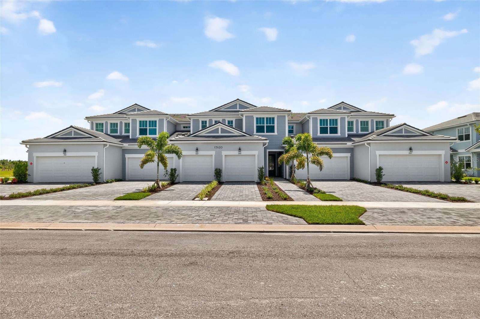 The Carmel II in Lakespur embodies refined coastal living, blending modern design with elevated finishes curated for a sophisticated Florida lifestyle. From the moment you enter, the home feels bright, airy, and intentionally crafted—enhanced by 8' interior doors, Crushed Ice designer paint, and expansive Adamo 12x24 tile laid in an upscale 70/30 stagger throughout the main living spaces.

At the heart of the home, the Executive Kitchen delivers a true luxury experience with Elkins White cabinetry, 42" uppers with crown, Stanton satin-nickel pulls, and Level 4 Soapstone Mist quartz across both the perimeter and the oversized island. Premium Whirlpool stainless appliances, including a 36" cooktop, wall oven/microwave combo, and a sleek stainless canopy hood, elevate both style and function. A Baker Blvd brick-set backsplash completes the designer look.

The owner’s suite is a serene retreat featuring a zero-entry walk-in shower, floor-to-ceiling Adamo wall tile, 2x2 mosaic shower floor, and a raised-height vanity with Level 4 quartz and brushed-nickel finishes. Bath 2 mirrors the same elevated aesthetic with a shower in lieu of tub, full tile to the ceiling, and matching cabinetry and quartz.

Additional luxury touches include LED recessed lighting, pendant pre-wires, TV mount prep, Satin Nickel hardware, and a screened lanai ideal for year-round indoor-outdoor living.

Photos, renderings and plans are for illustrative purposes only and should never be relied upon and may vary from the actual home. Pricing, dimensions and features can change at any time without notice or obligation. The photos may be from a furnished model home and not the home offered for sale.