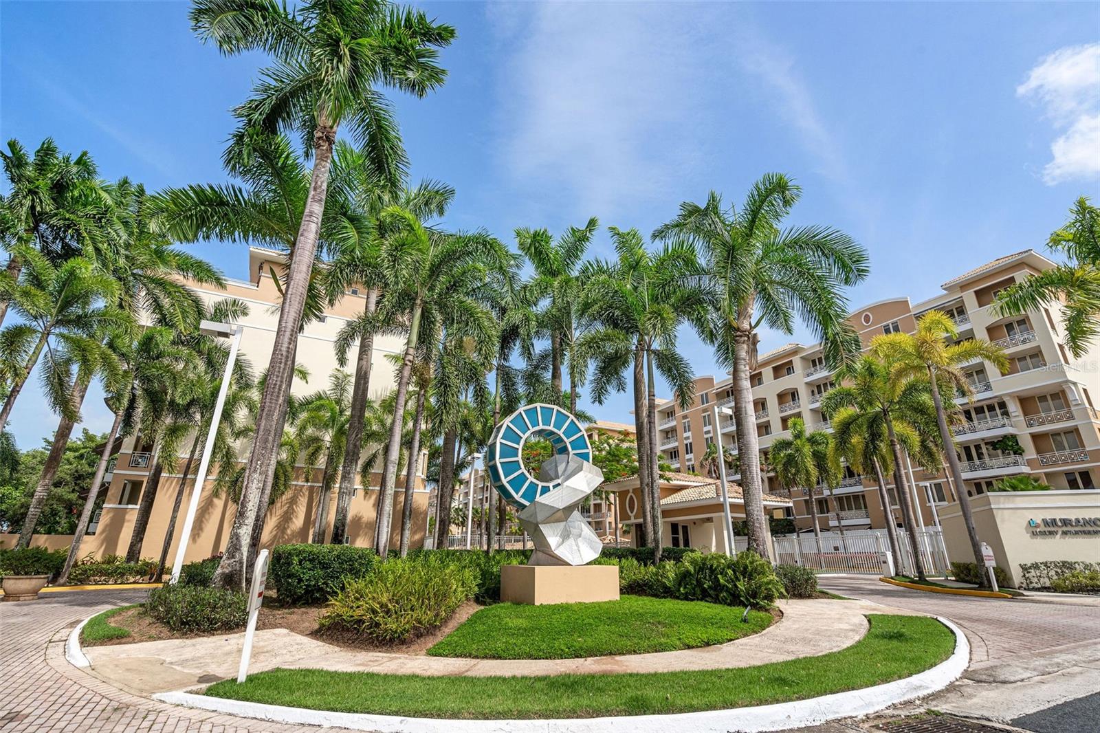 Elegant Residence with Panoramic Views and Resort-Style Amenities
Experience the comfort of a private home with the convenience of condominium living. The main floor features three spacious bedrooms, two full bathrooms, powder room, a modern eat-in kitchen, family area, and a large laundry room with storage. Expansive windows frame with picturesque views of lush trees and charming red-tile rooftops, filling the space with light and serenity.
Upstairs, enjoy a private bedroom with full bath, a spacious family room, and access to a generous terrace—perfect for entertaining or relaxing in style.
Residents benefit from resort-style amenities, including a pool, racquetball court, playground, gym, residents’ lounge, and 24-hour security, along with three covered parking spaces.
A rare opportunity that combines elegance and  privacy.