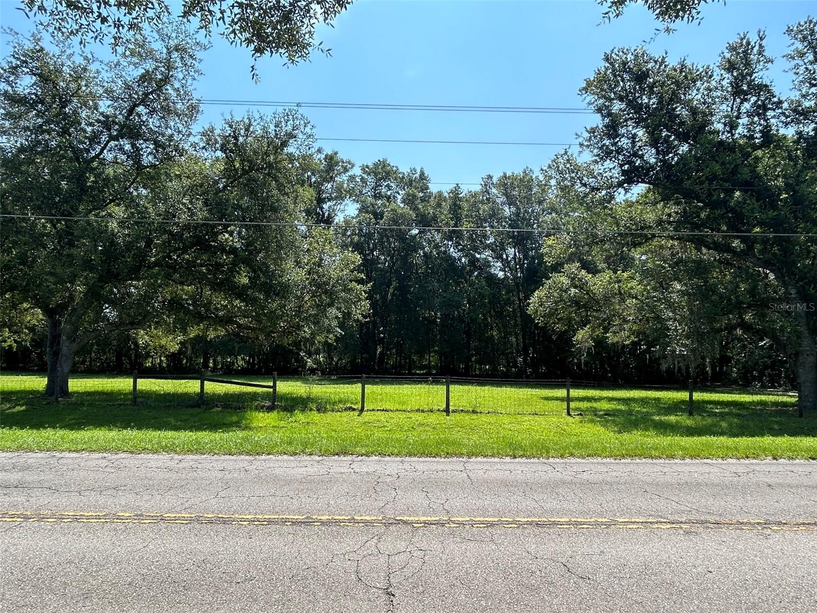 DEVELOPER ALERT! This well located 5.01 acres has recently been rezoned to R-1A, which allows 1-4 units per acre.