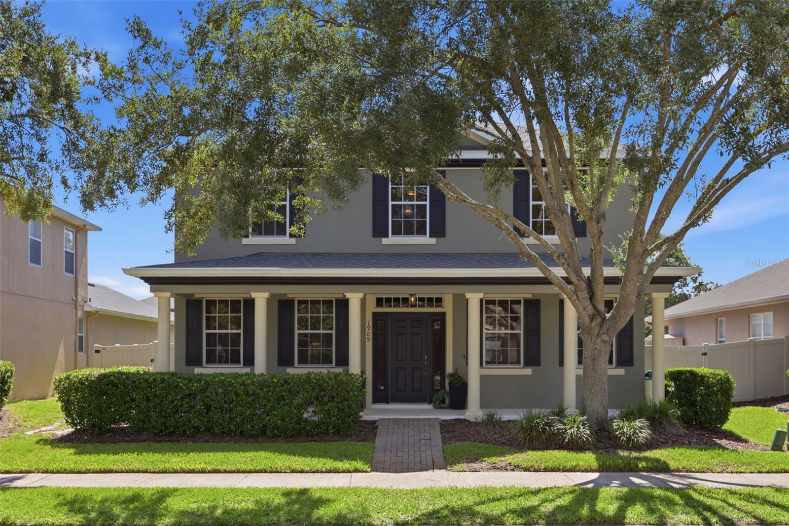 Welcome home to this beautifully maintained residence in the highly desirable Legacy Park community of Casselberry, where comfort, style, and thoughtful upgrades come together. From the charming covered front porch to the spacious fenced backyard, this home offers inviting spaces both inside and out. Fresh interior paint creates a bright, move-in-ready feel, while the screened rear porch is the perfect place to enjoy your morning coffee or unwind in the evenings. The thoughtfully designed floor plan features formal rooms, large kitchen with island and eat-in area, a spacious primary suite complete with generous his-and-her walk-in closets, providing exceptional storage and convenience. Upstairs, an open loft offers endless possibilities as a home office, media room, playroom, or additional living space. Car enthusiasts and EV owners will appreciate the Tesla charger already installed in the garage, making charging at home simple and convenient. BRAND NEW ROOF 2026, Fresh exterior paint 2024, New AC 2023,  Updated light fixtures throughout! As an added bonus, the seller is offering a $5,000 flooring credit, giving buyers the opportunity to personalize the home with flooring that matches their own style and vision. Located in the sought-after Legacy Park neighborhood, a short stroll to The Geneva School campus, this home combines a welcoming  atmosphere with community pool and convenient access to shopping, dining, parks, and major roadways. Don't miss the opportunity to make this exceptional property your own—schedule your private showing today and experience everything this wonderful home has to offer!