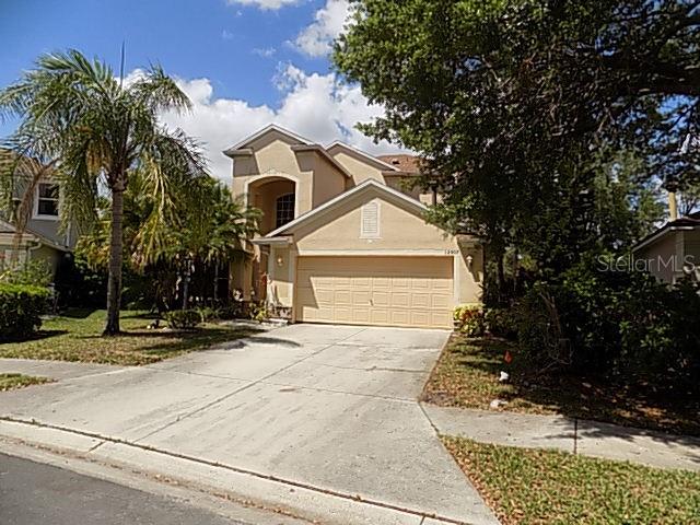 This 3-bedroom, 2.5-bath block POOL home offers 2,234 sq ft of living space, featuring a versatile bonus room and an open loft. The layout includes a formal living room and dining room, along with a spacious family room that opens to a screened-in pool area—perfect for indoor-outdoor living. The kitchen includes a cozy breakfast area, and the home boasts high ceilings throughout. The primary bedroom on the first floor also provides direct access to the pool area. A dramatic two-story foyer with an open staircase creates a welcoming first impression, and a dedicated laundry room adds convenience. Situated on a cul-de-sac in desirable Lakewood Ranch, the home is just steps from a large lake and close to Summerfield Park, as well as Lakewood Ranch Main Street with its shops, restaurants, movie theater, and hospital. Conveniently located near I-75, this home offers an ideal setting for commuting. A great opportunity to personalize and update to your own taste, this property offers strong potential in a highly sought-after location.