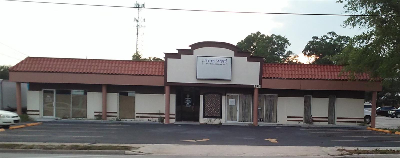 Prime South Orange Avenue commercial investment — and it's already working for you. This dual-tenant, mixed-use building at 5924/5926 S Orange Ave sits on one of Orlando's most traveled commercial corridors, zoned C-3 for maximum use flexibility. C-3 zoning offers one of the broadest commercial use classifications in Orange County, giving a future owner maximum flexibility to retain current tenants, re-tenant at market rates, or reposition the asset entirely. C-3 Zoning allows for uses such as an auto dealership, restaurant, laundromat, tire shop, auto parts, and boat dealer, among others.  Please confirm your intended use with the county.

The building is currently occupied by a Motorcycle/Bike shop and a church.  One tenant has lease in place through July 2026 and would like to remain while the second tenant is month to month and is happy to stay, or could be vacated for owner/occupant use.  With two established tenants in place this property delivers immediate cash flow. 

South Orlando's 32809 submarket continues to benefit from population density, proximity to Universal Studio, Disney World, Orlando Regional Hospital and Orlando International Airport, and consistent consumer traffic, making this an ideal hold, value-add, or long-term legacy asset. Whether you're a seasoned investor looking to expand your Central Florida portfolio or a business owner seeking an owner-user opportunity with rental income to offset carrying costs, this property checks the boxes.  Proof of funds or lender pre-approval required for showings. Do not disturb tenants. Showing by appointment only.