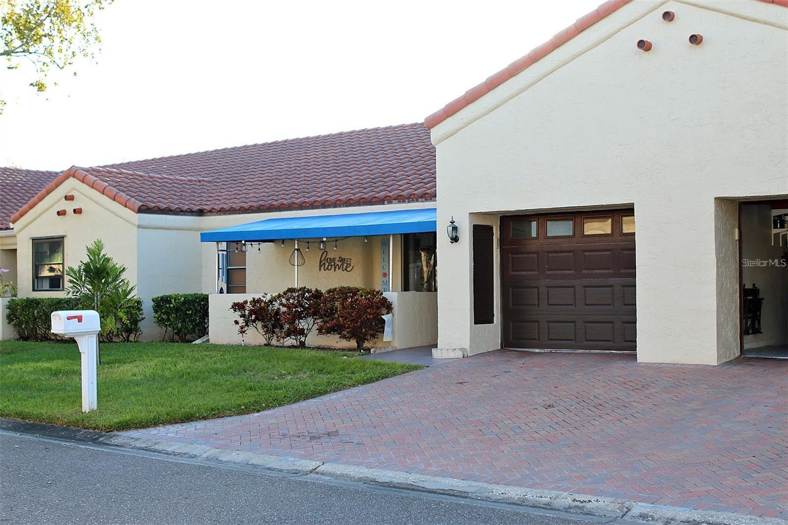 Welcome Home to Maintenance-Free Florida Living!
Discover the perfect blend of comfort, convenience, and community in this beautiful 2-bedroom, 2-bath villa located in the highly desirable 55+ community of Mainlands of Tamarac by the Gulf. Offering 1,132 square feet of thoughtfully designed living space, this home delivers the carefree Florida lifestyle you've been searching for.
Step inside to find a spacious living room, comfortable family room, abundant natural light, and an inviting floor plan designed for both everyday living and entertaining. The kitchen provides ample workspace and flows seamlessly into the dining and living areas, creating an ideal setting for gatherings with family and friends.
The generously sized primary suite features a walk-in closet and private bath, while the guest bedroom offers comfort and flexibility for visitors, hobbies, or a home office. Enjoy your morning coffee or evening beverage from the private covered front porch while taking in the peaceful surroundings and beautiful landscaping.
Additional highlights include hurricane shutters, irrigation system, attached garage, sliding glass doors, ceiling fans, and central air conditioning that provide both comfort and peace of mind.
What truly sets this home apart is the exceptional value of the community. The HOA covers water, cable, internet, trash, exterior maintenance, grounds maintenance (including outdoor painting), road maintenance, irrigation and roof replacement, allowing you to spend less time worrying about home maintenance and more time enjoying life. Residents enjoy golf-cart-friendly living, a heated community pool, clubhouse activities, social events, and access to the beautiful Mainlands Golf Course.
Conveniently located just minutes from Gulf beaches, shopping, dining, medical facilities, and major airports, this home offers easy access to everything the Tampa Bay area has to offer. Whether you're seeking a year-round residence or a seasonal retreat, this villa delivers outstanding value, comfort, and lifestyle.
Don't miss your opportunity to own one of Pinellas County's best maintenance-free living experiences. Schedule your private showing today!