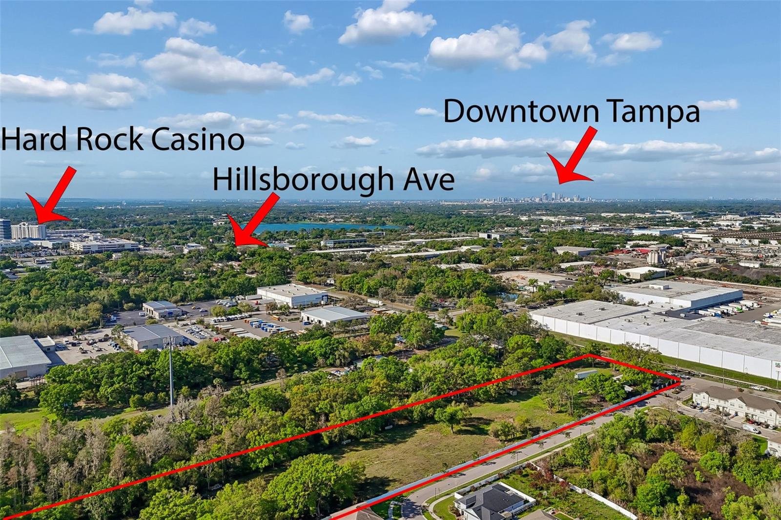 5 Acre Prime Development Site - Rezoning Potential for Multifamily or Commercial. Rare opportunity to acquire 5 acres in a high-growth corridor with strong residential and commercial adjacency. The property is located directly adjacent to an established townhouse community and single-family homes to the north with commercial properties nearby—making it an ideal candidate for rezoning and redevelopment.
Located just 2,600 feet north of Hillsborough Avenue, the site benefits from excellent accessibility and connectivity to major thoroughfares and surrounding demand drivers. The property features approximately 167 feet of frontage on Orient Road, providing strong visibility and access for future development. Currently zoned ASC-1, the site presents a compelling value-add opportunity through a potential rezoning to multifamily or general commercial. Based on surrounding uses and growth patterns, the property is well-suited for:Townhome development, Garden-style or mid-rise apartment project,
Self-storage facility, or
Neighborhood-serving commercial. 
The surrounding mix of residential density and nearby commercial activity supports a wide range of development scenarios.
The site is mostly fenced and includes mature trees and a small pond offering flexibility in site planning and design. Existing improvements include multiple structures (two residential buildings, storage building, and a four-car garage), which contribute minimal value and are considered redevelopment-ready.

Parcel 6211 is included in the offering.

This is a strong infill development play with rezoning upside in a rapidly expanding submarket, ideal for developers seeking to capitalize on residential growth and increasing demand for housing and commercial services.