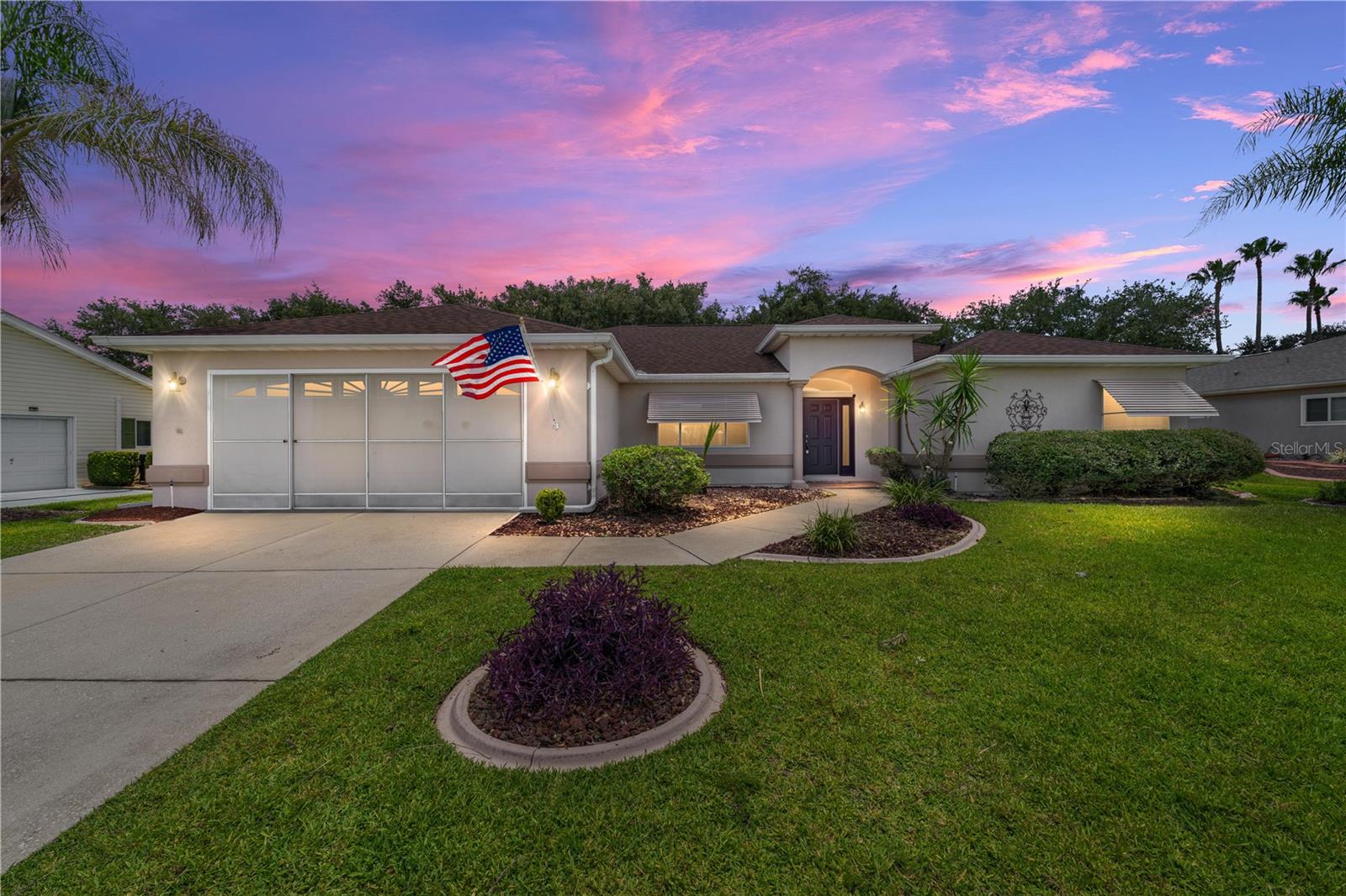LOCATION LOCATION LOCATION Great location Directly across the Boulevard from the HORIZON CENTER and Restaurant in the AWARD-WINNING Del Webb Spruce Creek Golf & Country Club. If you are looking for a spacious home at an affordable price, THIS EXPANDED ASPEN IS IT. The split floor plan includes 3 bedrooms, 2 bathrooms, Formal Living and Dining Rooms with a combo Kitchen, Breakfast Nook and Family Room and is just a short walk from the Horizon Community Center, the Outdoor Family Pool, Bocce Ball Courts, Shuffle Board, Liberty Grill Restaurant and the PRO Shop! NEW ROOF July 2024. HVAC 2016.  Low maintenance rock landscape beds with poured concrete landscape curbing. The primary bathroom has separated His/Her vanities and walk-in closets. The Kitchen has White cabinets with stunning GRANITE countertops. Black Stainless Kitchen Appliances. The comfortable lanai is under roof with screens and windows. A large 25'x12' COVERED BIRDCAGE was built in 2019 overlooking the landscaped backyard which also has a paved area for your Barbecue Grills and smoker. This size and layout provides for a lot of good living. REALTORS, THIS IS NOT THE NORMAL ASPEN MODEL..IT IS VACANT, COME SEE IT for yourself.  Homes this size and quality have recently sold for much higher prices than this offering. GOOGLE EARTH measures Approximately 750 feet OR 360 AVERAGE STEPS to the Restaurant, Golf Pro Shop, Horizon center with clubs, resort pool, billiards, bocci ball, shuffleboard, etc.   This is an opportunity to enjoy living in Del Webb Spruce Creek Golf & Country and stay within your budget! NO BONDS OR CDD FEES HERE! VALUE PRICED! Come see this one!