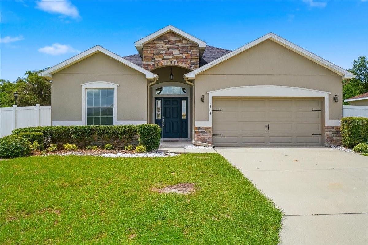 The property you're inquiring about is located in Lake Alfred, FL, in the desirable Water's Edge at The Lakes community in Polk County. This beautiful neighborhood is tucked away in its own peaceful cove, offering privacy and a welcoming atmosphere.
Situated on a corner lot with beautiful landscaping, this stunning 4-bedroom, 2.5-bath home offers over 2,000 square feet of living space and is filled with thoughtful custom-made upgrades throughout, including the wall in the living room and custom-made wood cabinets in the laundry room.
The open-concept floor plan is a dream for anyone who loves to cook and entertain. The extended custom kitchen features quartz countertops, three ovens, custom-built pantry, and custom kitchen drawers, providing exceptional storage and functionality. Beautiful tile flooring flows throughout the entire home, creating a seamless and elegant look.
Step outside to the screened lanai, which opens to an inviting paver patio with a built-in fire pit and seating area—the perfect setting for relaxing evenings or entertaining family and friends. The fenced backyard offers additional privacy and space to enjoy the outdoors.
This home combines comfort, style, and quality craftsmanship in one of Lake Alfred's most desirable communities.
Call, text, or email today to schedule your private showing! *Agents, please read MLS remarks."
