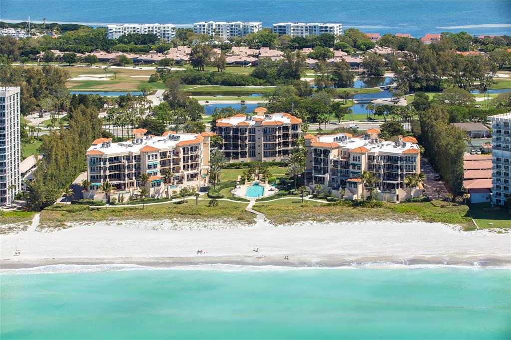 Located in the intimate beachfront enclave of Vizcaya, this 3 bedroom Penthouse with direct azure water views lives like a single family home offering the most spacious balconies with the benefit of resort-style amenities and a private two car garage. The kitchen has been reconfigured from the original floor plan to maximize the Gulf views to the west, while Sarasota Bay views can be enjoyed at the sink looking east. The main terrace is oversized, measuring 15’ in width at its widest point and approximately 50’ in length with glass rails for unobstructed views of the water and well-manicured grounds. The split floor plan allows owners privacy with the master suite boasting 3 separate walk-in closets, a skylight in the master bath above the roman tub and sunset views in the evenings. The second guest bedroom is ensuite with plantation shutters, a separate entrance perfect for extended family stays and a terrace facing east to enjoy the sunrise and Sarasota Bay views. The third guest bedroom is currently being used as a den, but also accesses the east terrace and uses the full bath with shower in the guest wing hall. Residents will enjoy the convenience of a full sized laundry room inside the unit complete with sink, built-in cabinetry and a fold away ironing board. Other highlights include 10’ ceilings, elegant double door entry, solid interior doors, summer kitchen, private entry courtyard, marble foyer, generous closet space and the first floor private two car garage. Vizcaya is a luxury community featuring romantic Mediterranean architecture, courtyards and fountains all in the distinctive style of Addison Mizner.  It is situated on 500 feet of beach front on the Gulf of Mexico and is the essence of quiet sophistication with only 31 residences on the south end of Longboat Key.  Lush, mature landscaping enhances the private serene feeling of the grounds. Included within Vizcaya is a separate clubhouse with a spacious social room, catering kitchen and fitness center including a hot tub and locker rooms.  There is a Har-Tru tennis court on site and a management couple lives within the complex and proves Vizcaya’s legendary service.  Close proximity to the Longboat Key Club, St. Armands Circle and downtown Sarasota provides access to fine dining and shopping while still relaxing on island time.  This is island living at its best. Room Feature: Linen Closet In Bath (Primary Bathroom).