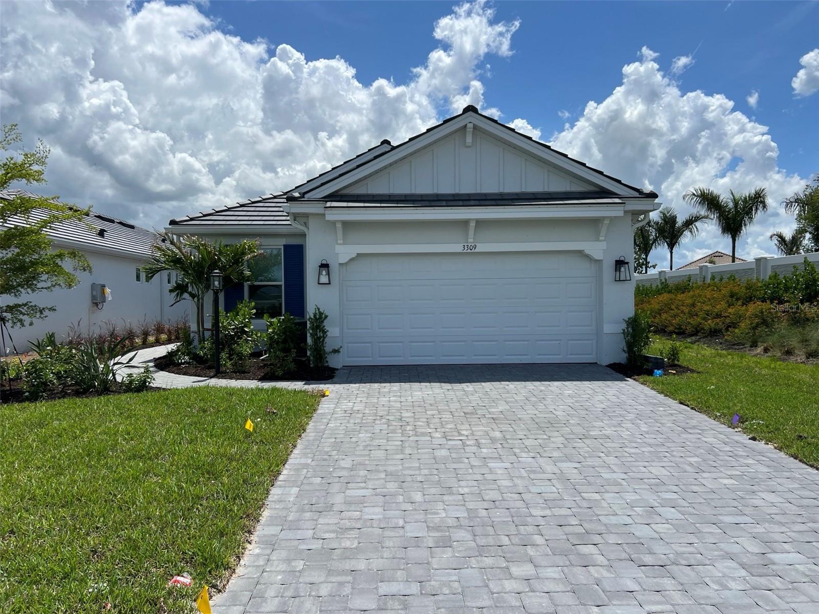 Under Construction. What's Special: Golf Course Community | Dedicated Study | Extended Patio | Single Level Living. New Construction - June Completion! Built by America's Most Trusted Home Builder. Welcome to the Arezzo at 3309 Porto Lane in Esplanade at Azario Lakewood Ranch! This stunning new home welcomes you through a side entry into an open layout designed for easy, connected living. The kitchen features an apron front sink and overlooks the dining area and great room, creating a natural gathering space that flows directly to the extended screened lanai. Whole house impact windows add peace of mind while keeping the home bright and airy. The primary suite sits just off the great room and offers a private bath with dual sinks, a water closet, and a spacious two-sided walk-in closet. On the opposite side of the home, two secondary bedrooms, a full bathroom, a dedicated study, a convenient laundry room, and garage entry provide comfort and flexibility for everyday life. Additional Highlights Include: Study in place of flex, extended screened lanai, tray ceiling package, 8' interior doors, additional sink at bath 2, impact windows, and cushion close doors and drawers. Photos are for representative purposes only. MLS#A4690003 - Resort-Style Living in Esplanade at Azario Lakewood Ranch, the perfect blend of relaxation and recreation! Enjoy the heated resort-style pool, state-of-the-art fitness center, and energizing aerobics classes. For outdoor enthusiasts, there are pickleball courts, scenic trails, Vitality Park, and if golf is your game, you'll love Esplanade's 18-hole championship course! Unwind with a facial massage or by the fire pit after a workout. Exclusive amenities like a Wellness Center, Culinary Center, and sports courts ensure there's something for everyone, whether you want to stay active or relax in style.
