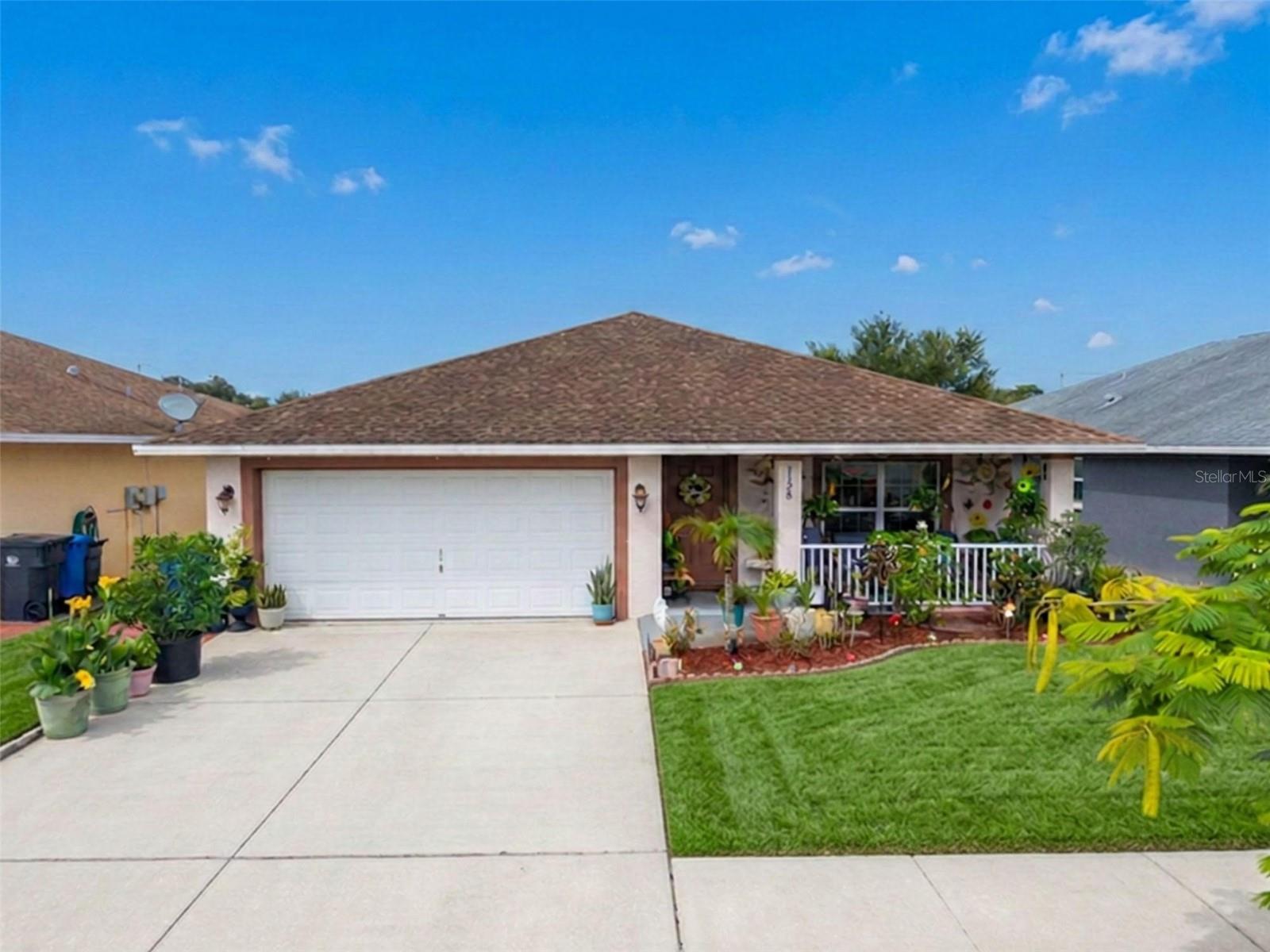 Welcome to 1128 Shared Passion Street! This beautifully maintained 3 bedroom 2 full bath home features an open-concept floor plan with spacious living areas, creating the perfect space for both everyday living and entertaining. The modern kitchen has lots of counter space, abundant cabinetry, and a cozy eat-in dining area that is sure to satisfy any chef's delight. The private owner's suite includes a spacious walk-in closet and an en-suite bath, while the additional bedrooms provide plenty of room for family, guests, or a home office. Step outside to the covered lanai overlooking the backyard—an ideal setting for relaxing or hosting weekend gatherings. Conveniently located near I-75, shopping, dining, schools, and Florida's beautiful Gulf Coast beaches, this home offers the perfect combination of comfort, convenience, and exceptional value. Don't miss your opportunity to make this wonderful home your own!