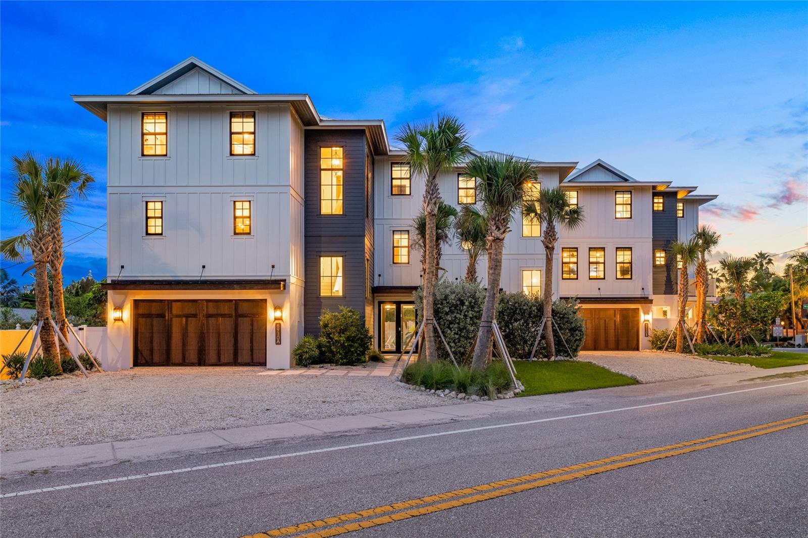 There is only one – Point of Rocks. This is luxury living … served on the rocks. Welcome to Point of Rocks, a home crafted with the same care, balance, and attention to detail as a perfectly mixed drink. Smooth where it should be, bold where it counts, and designed to age beautifully, this thoughtfully curated residence delivers a taste of Siesta Key living that never goes out of style. Designed with farmhouse-inspired décor and three levels of luxuriously livable space, this home invites you to sip, savor, and settle in. High-quality materials and resilient finishes ensure that the aesthetic stays fresh and the home itself stays strong, even with the steady rhythm of rental guests. The ground level sets the flavor profile with a spacious garage/game room and a resort-style pool complete with a custom, rock-inspired water slide, a wink to the home’s playful name. It’s the ultimate place to kick off island hours, toast the sunset or serve up memories on ice. The second level blends design and livability into one smooth pour. The great room, with its timeless palette and elevated farmhouse textures, feels equal parts cozy and chic — ideal for savoring a quiet morning coffee or mixing evening cocktails. The primary suite on this level is its own signature sip: refined, calming, and intentionally crafted. The top floor hosts four comfortable and private en suite bedrooms, each one layered with durable materials chosen to stand the test of time in both style and quality. A dedicated gaming lounge adds another layer of fun, making this level the playful finishing note for guests of all ages as the perfect garnish to this well-balanced home. Whether you're craving an income-producing investment, a coastal escape, or a little blend of both, Point of Rocks delivers a lifestyle that’s relaxed, memorable, and endlessly enjoyable. Raise a glass — this is Siesta Key living...on the rocks. More than a home, Point of Rocks is part of the exclusive Vunique Luxury Residences with a proven history of strong rental performance — each residence one-of-one, purpose-built to balance bold design and bespoke experience. Here, ownership transcends address; it becomes a mark of belonging to something beautifully uncommon.