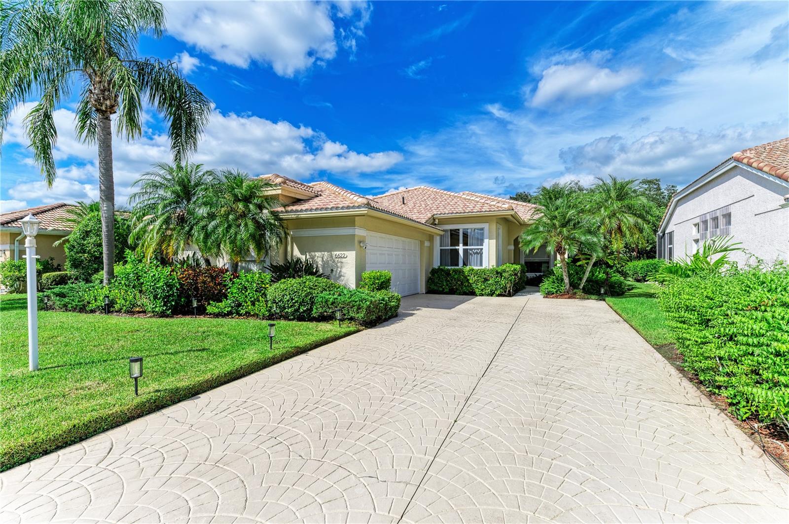 Welcome to your dream home in the prestigious River Club community of Lakewood Ranch! This beautifully updated one-story residence offers 3 spacious bedrooms, 2 modern bathrooms, a 2-car garage, and breathtaking views of the golf course and preserve. With a perfect blend of style, comfort, and location, this property is a rare gem—priced to move quickly.
Interior Highlights
• Bright & Airy Layout with abundant natural light and upgraded luxury vinyl plank flooring throughout
• Remodeled Chef’s Kitchen featuring white cabinetry, granite countertops, stainless steel appliances, and seamless flow into the great room—perfect for entertaining
• Primary Suite Retreat with lanai access, serene golf course views, large walk-in closet, and dual vanities
• Stylishly Updated Bathrooms with contemporary fixtures and finishes
• Functional Laundry Room with cabinetry, workspace, and oversized sink

Outdoor Living
Step into your private screened lanai and enjoy tranquil mornings or relaxing evenings overlooking lush greenery and fairway views. The expansive backyard offers ample space to extend the lanai or add a custom pool—design your own outdoor oasis!

Recent Upgrades
• Brand New AC (2025)
• Remodeled Kitchen & Bathrooms
• Newer Roof
• Fresh Interior Paint
• Plantation Shutters & Upgraded Lighting Throughout
Prime Location & Lifestyle
River Club is one of Lakewood Ranch’s most desirable communities—offering peace, privacy, and unbeatable convenience. With low HOA fees, no CDD, and no mandatory golf membership, it’s one of the most affordable golf course neighborhoods in the region.
Enjoy proximity to:
• Waterside Place & Lakewood Ranch Main Street
• UTC Mall & Heritage Harbour
• Top-rated schools & medical facilities
• Easy access to I-75, SRQ/TPA airports, Sarasota, Bradenton, St. Pete, Clearwater & world-class Gulf Coast beaches
Room to Add a Pool
Fees Low HOA, No CDD, No Golf Membership Required
Updates New AC (2025), Kitchen & Bath Remodel, Newer Roof
This is your chance to own a move-in-ready home in a premier golf course community—without the premium price tag. Schedule your private showing today before this opportunity disappears!