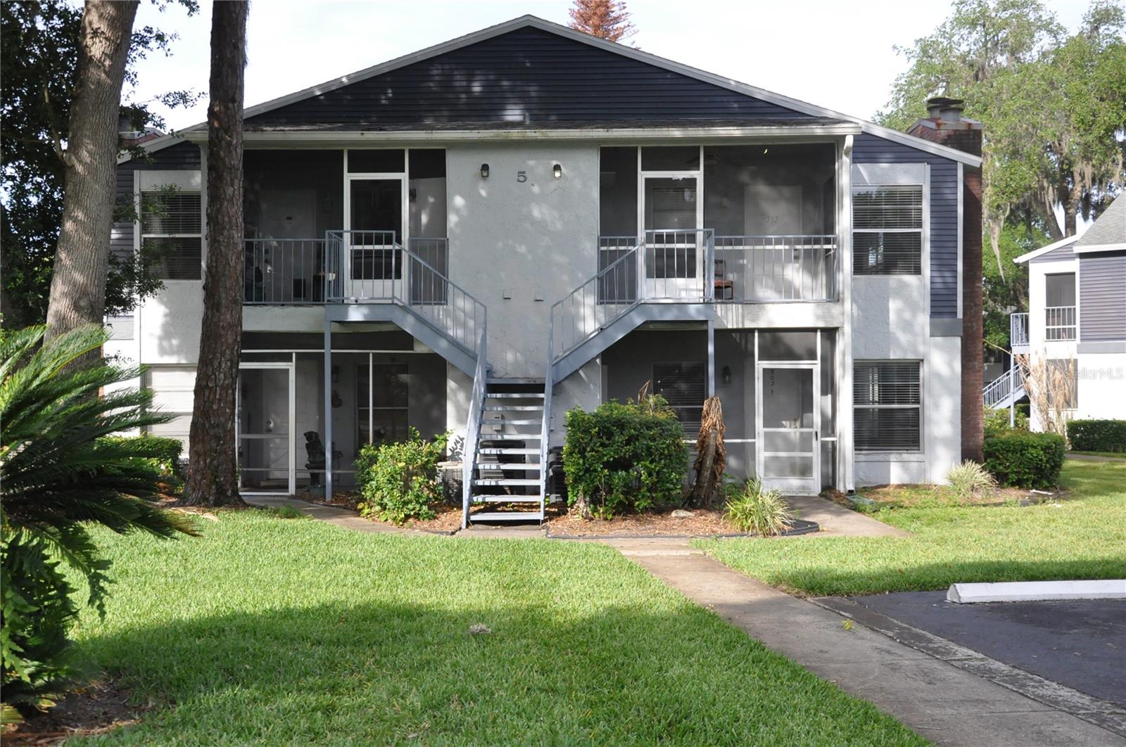 Start your day off with Peace and Tranquility. Check out this Fabulous 2nd Floor Condo in Northlake Village with views of Lake Minnie in the heart of Sanford. Nestled in the middle of the complex, Building 5 is one of the most convenient buildings as it is near the pool, tennis court and mailboxes. When you walk through the front door of this marvelous Condo, you immediately feel positive energy from the trees and nearby lake. Open and spacious layout, it has a split 2\2 bedroom plan with each bedroom having its own bathroom space.   Although HSF seems small, this Condo has a layout designed to use all of the space provided, as most Builders did in the mid-80s. Views of nature, trees and Lake Minnie that you see daily from your front window are simply priceless.  The Wood Burning Fireplace in the Family Room near the back porch and Primary Bedroom creates a cozy ambiance with the glorious lake and tree combination for the entire place. Amazing amenities such as a clubhouse with fitness center, pool, racquetball & tennis courts are another big plus in Northlake Village. Top-notch Seminole County Schools. Zoned for Lake Mary High School. Perfect location that is close to Sanford Airport, Sun Rail Station, 17-92, 417, 46, and 1-4. Not to mention a plethora of restaurants and shopping everywhere. PLUS+ this location is also just a hop, skip, and jump to Beaches on both coasts and Theme Parks using major roadways near the community. Do yourself a favor and check out this Charming CONDO in person to imagine yourself living here and feel the positive vibes with nature.