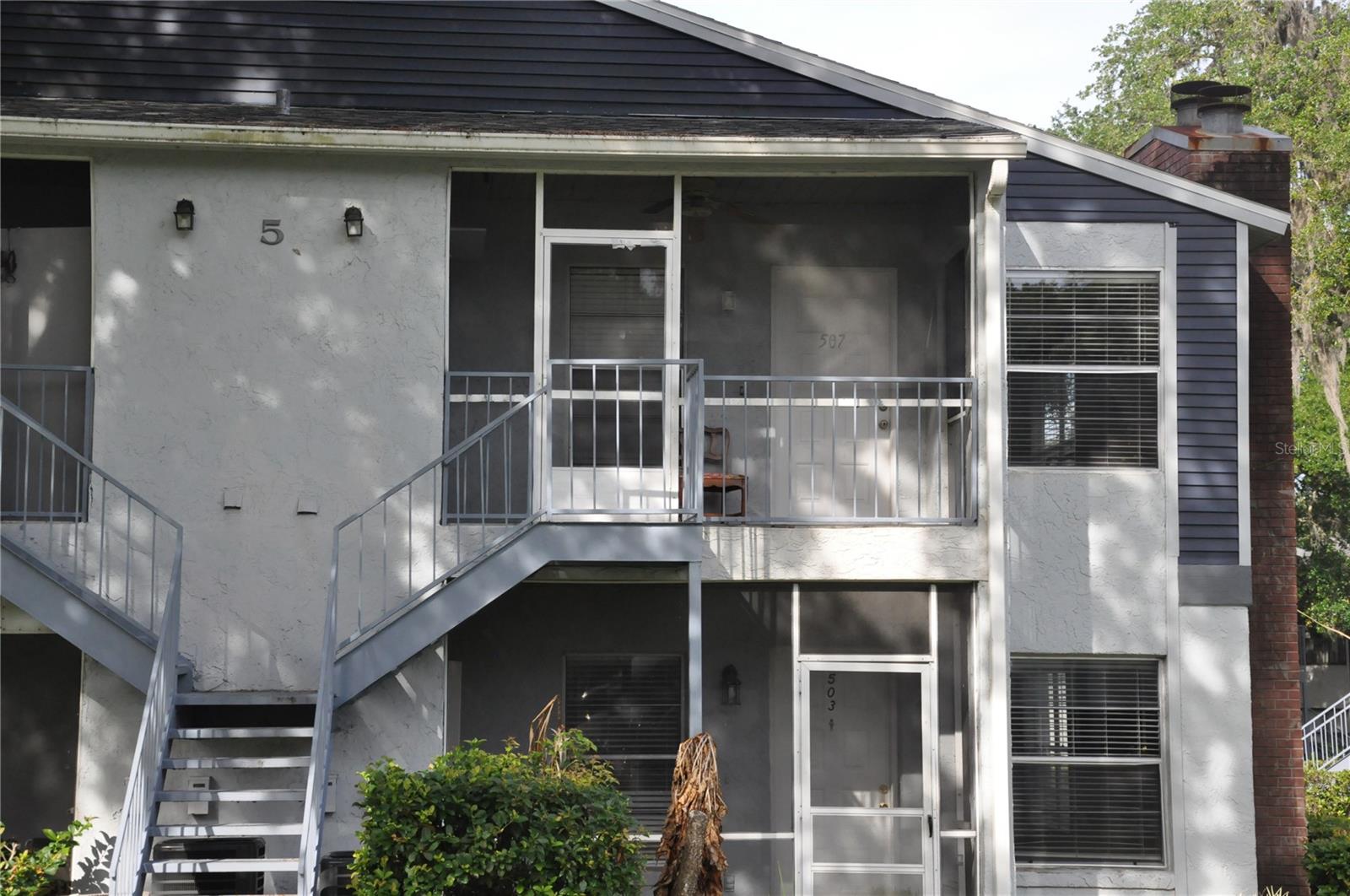 Wake up each morning to peaceful views of Lake Minnie and the natural beauty that surrounds this charming second-floor condominium in Northlake Village, one of Sanford's most desirable lakefront communities. Ideally situated in Building 5, one of the community's most convenient locations, you'll enjoy easy access to the pool, tennis courts, clubhouse, and mailboxes while still being tucked away among mature trees and serene lake views. Step inside and immediately feel at home in the bright, inviting floor plan that maximizes every square foot. This well-appointed split-bedroom layout offers two spacious bedrooms and two full bathrooms, providing privacy and comfort for residents and guests alike. Large windows showcase beautiful views of the surrounding greenery and Lake Minnie, creating a tranquil backdrop that's hard to find. The cozy wood-burning fireplace serves as the heart of the living area, adding warmth and character while complementing the peaceful natural setting. Just beyond, the private screened porch offers the perfect place to enjoy your morning coffee, unwind after a long day, or simply take in the sights and sounds of nature. Residents of Northlake Village enjoy an impressive array of amenities, including a clubhouse with a fitness center, swimming pool, racquetball courts, tennis courts, and beautifully maintained grounds. Located within the highly sought-after Seminole County School District and zoned for Lake Mary High School, this property combines convenience with an exceptional lifestyle. The location is unbeatable, with easy access to Sanford International Airport, SunRail, SR-417, I-4, US-17/92, and SR-46. Shopping, dining, entertainment, and everyday conveniences are all just minutes away. Plus, with Florida's world-famous beaches and theme parks easily accessible via nearby major highways, weekend adventures are always within reach. Whether you're searching for a primary residence, seasonal retreat, or investment opportunity, this inviting condominium offers the perfect blend of comfort, convenience, and natural beauty. Come experience the peaceful lifestyle of Northlake Village and discover why you'll love calling this special place home.