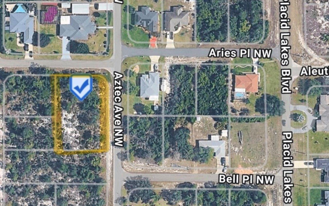 Build your dream home on this expansive 0.52-acre oversized corner lot in the peaceful Placid Lakes community. This prime residential location offers 22,500 square feet of space, providing a generous canvas for a custom residence, pool, and outdoor living area. The property features a blend of mature greenery and natural clearings, situated in a quiet neighborhood known for its proximity to local lakes and recreation. Located in Flood Zone X and zoned R1A, this lot is ready for your single-family development. Enjoy the tranquility of Lake Placid with the convenience of being near Placid Lakes Blvd.