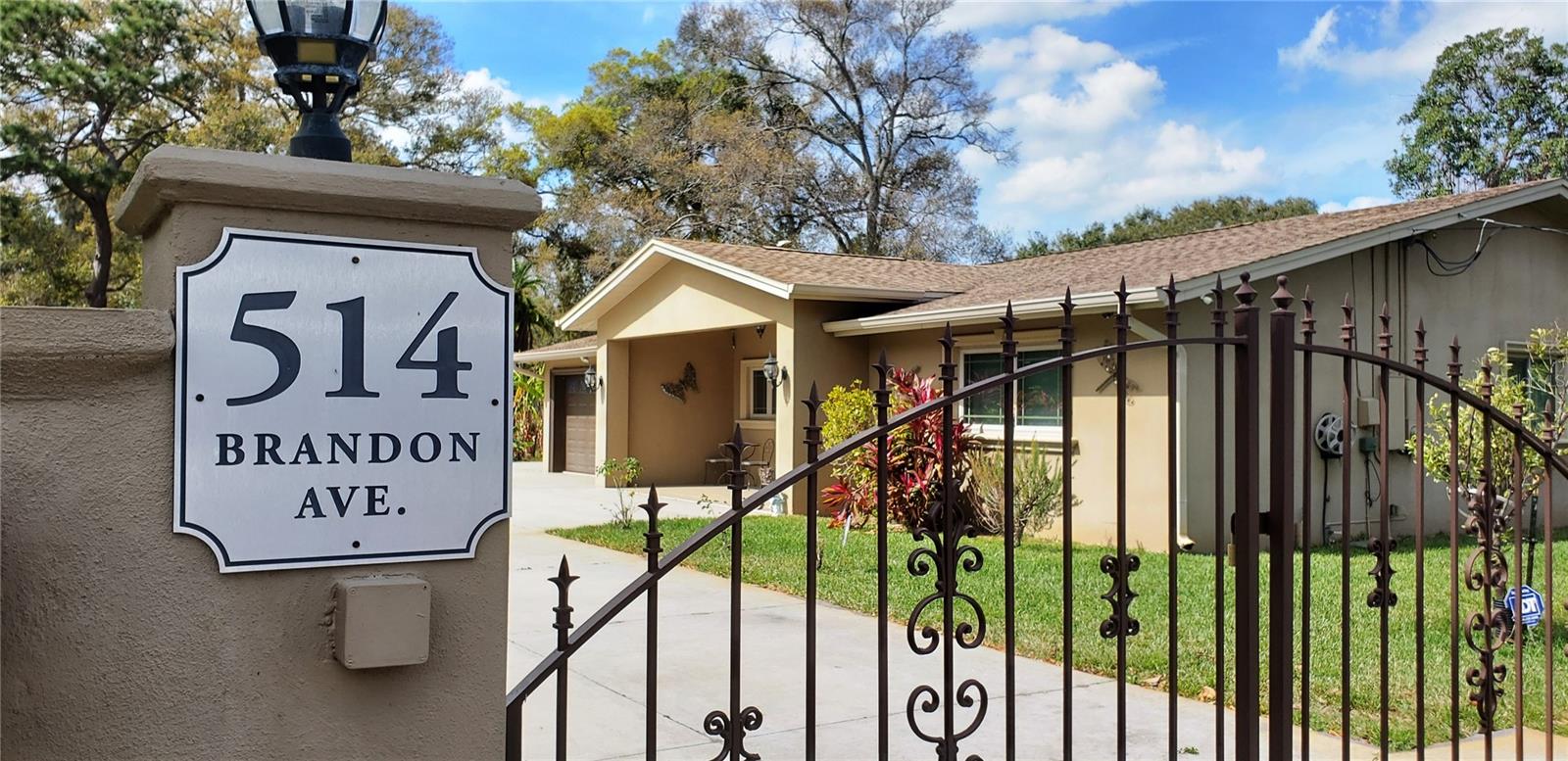 NO HOA RULES OR FEES! Updated and packed with POTENTIAL Located on a large, corner, Vinyl fenced lotwith private gated entry adjacent to a Golf course and city park. This home boasts several updates including IMPACT WINDOWS, oversizedcustom entry doors leading into a very fresh & clean home updated with ceramic tile, neutral paint, crown molding throughout as well as 2 NewHVAC units units with 2 separate thermostats. Not only does this home have a 3-bedroom 2 bath area with living room, dining area and kitchenin the front half, but as an ADDED BONUS there is an attached ADU or in-law rental with its’ private entrance on the back half. (included in totalbedroom count) This unit has another 2 bedrooms, bathroom and living/ kitchen area with the potential for additional income or a perfect spacefor your young adults or older family members. Additionally, the light & bright master bedroom is spacious & has own bathroom featuring aceramic tile, shower, & updated vanity. Just off the kitchen the dining area is perfect place to sit and gather w/ family & friends while preparingyour next meal. The kitchen cabinets are beautiful & provide more than enough storage. Look through the window over the sink & let thesunshine in! Impact windows, Irrigation system with landscaping & fruit trees finish it all off! Enjoy relaxing out on the front tiled porchoverlooking a privately fenced yard. The OVERSIZED parking pad and driveway offers plenty of space for multiple vehicles or a spot to park aboat, trailer, or RV at no additional cost! The first of a few new homes sits just next door with others to come behind it. The newer homes andprice points will make an impact on future values. Just across the street is The Landings Golf Club-one of Clearwater's many golf courses &Marymont park is on the other corner.. It's just a short drive to Florida's top beaches, international airport, shopping, restaurants, and more!