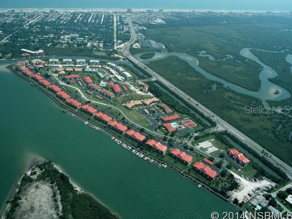 Corner unit with the best river views on the island due to the building significantly protruding beyond the neighboring structure.  Overlook the docked boats, Chicken Island, Old Fort Park and the downtown harbor.  Bouchelle Island has everything Florida offers...a river walk along the Intracoastal, boat storage and launch ramp, two heated pools, spa, tennis, clubhouse, fitness room, 18 hole chip and putt golf course and within walking distance to the beach! ;LocationDescription: Condo ;Water: City