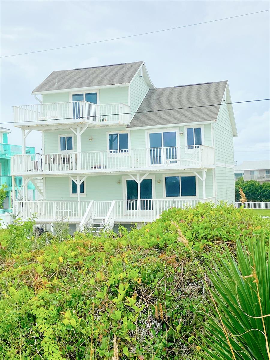 YOU DON’T Want to this opportunity to PASS you by !! 74’ of DIRECT OCEAN FRONTAGE nestled in a peaceful serene setting on the NO DRIVE Beach with your own private dune walk over on a one way street.  Hear the waves roll in and enjoy all the open views from your spacious 5 bedroom and 3 full bath home. Three stories of living ~Uniquely divided into 2 separate spaces ~both having their own entrance and balconies. The floors can be closed off and utilized separately or can all be accessible under one roof . This versatile living is yours for the taking! Practical for extended family or guests that require space while still remaining close. Located on the First floor is 2 bedrooms and one bath with an open living room, kitchen, and dining. On the second floor, the layout mirrors the first, with 2 Bedrooms and 1 Bath, same open living space ~ large granite kitchen with stainless appliances and breakfast bar along with dining space. The third floor is a private OCEAN VIEW bedroom with on suite bath and its very own balcony. If you are thinking of investing - one of the living spaces can easily be rented out without sacrificing space or views.  This Oceanfront home has an expansive lot with tons of parking and space for boats and RV. The two car garage/basement has ample room for vehicles and all your beach toys. 
At each Sunrise you will fall in love all over again with the unobstructed beauty and majestic views of the Atlantic Ocean as the surf  rolls onto shore effortlessly with the promise of a new day. “ALL INFORMATION IS DEEMED ACCURATE BUT NOT GUARANTEED. PLEASE VERIFY. ;Water: City