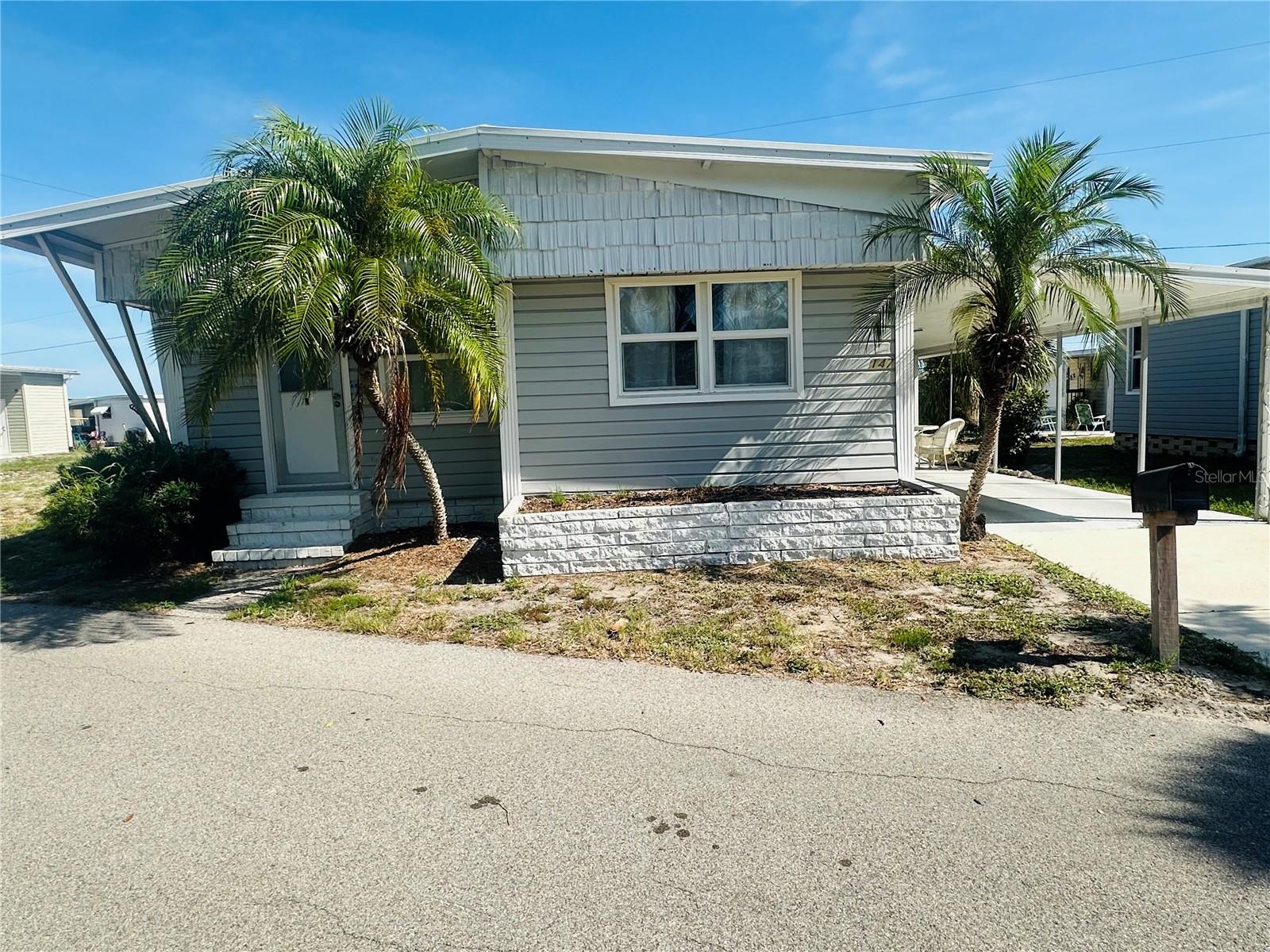 Spacious 2-bedroom, 2-bath mobile home located in the desirable Tropic Isles 55+ community. This unit features a comfortable floor plan with abundant natural light, newer windows, and a paved rear patio that provides an inviting outdoor space for relaxing or entertaining.
The generously sized living and dining areas adds flexibility for everyday living, while the attached oversized shed provides excellent storage and houses the washer and dryer for added convenience.
With solid bones and plenty of potential, this home presents a great opportunity for a buyer to update and personalize the space to their taste. Priced to reflect the updates needed, it offers exceptional value within this active resident-owned community. Residents enjoy access to a clubhouse, pool, fitness facilities, and a variety of social and recreational activities.
Whether you're looking for a seasonal retreat or a full-time residence, this property offers affordability, functionality, and the chance to make it your own.