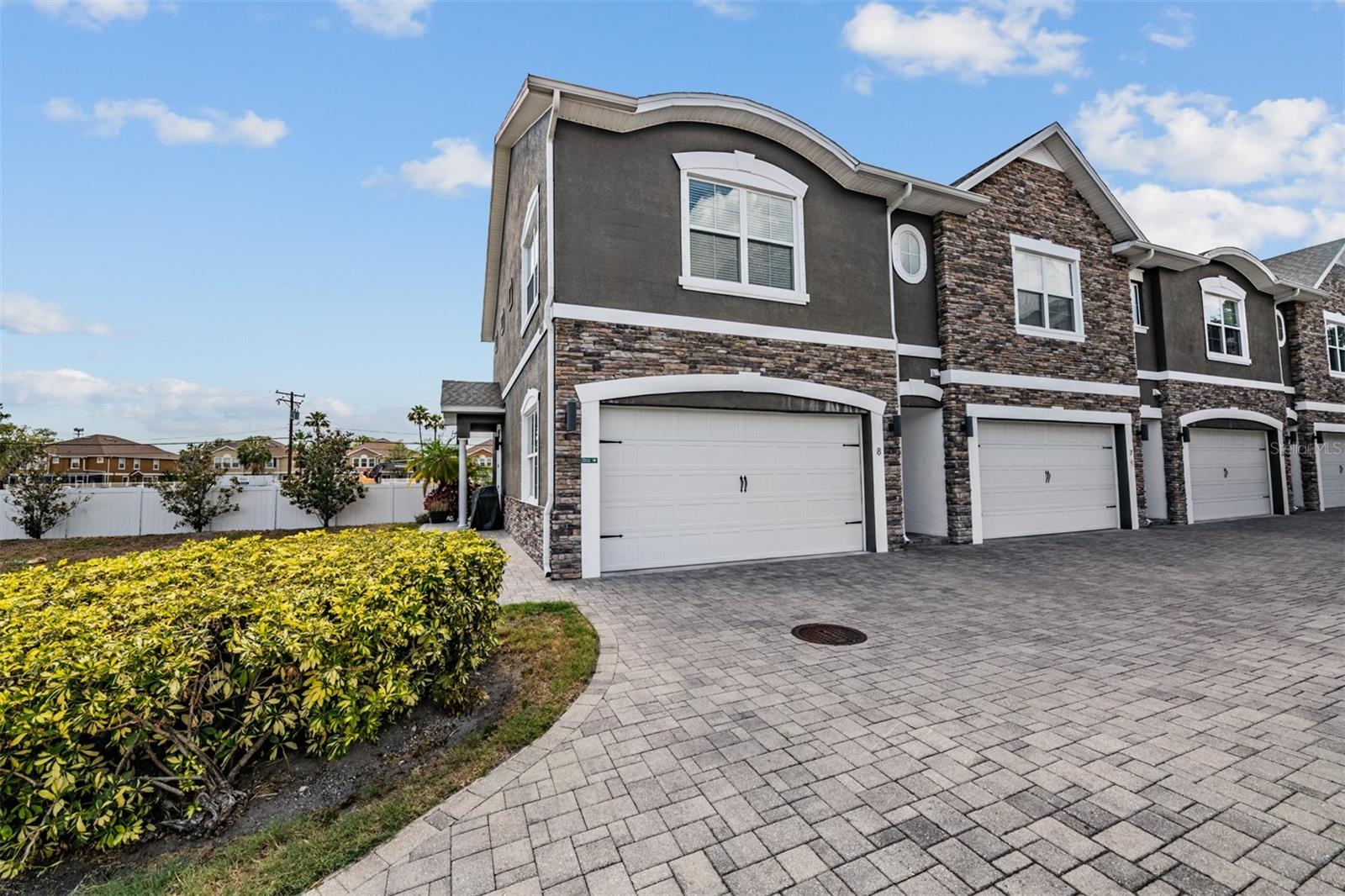 Welcome to the ultimate South Tampa lifestyle in this move-in ready 3BR/2.5BA townhome offering the perfect blend of style and convenience. Ideally positioned within the community, the spacious layout lives large with high ceilings and an open-concept design tailored for comfortable everyday living. As a highly coveted end unit, this home offers additional natural light and the unique advantage of a private side-entry door for convenient outdoor access - perfect for grilling, pet owners, or simply enjoying Florida’s year-round sunshine. The main level features a bright, open living room as well as a modern eat-in kitchen with granite countertops, soft-close shaker cabinetry, and stainless steel appliances. Upstairs, the primary suite includes a generous walk-in closet and an en-suite bath with dual vanities and a large shower. Two additional bedrooms and a second full bath provide flexible space for guests, family, or a home office. With quick access to the Selmon Expressway, this home offers an easy commute to both Downtown Tampa and St. Petersburg. Located less than one mile from MacDill Air Force Base, enjoy being just minutes from Bayshore Boulevard, the Westshore Marina District, Picnic Island Park, and some of South Tampa’s most popular shopping, dining and entertainment destinations. The low monthly HOA fee covers water, sewer, trash, and lawn care for easy, low-maintenance living. Explore the virtual 3D tour and schedule your private showing today!