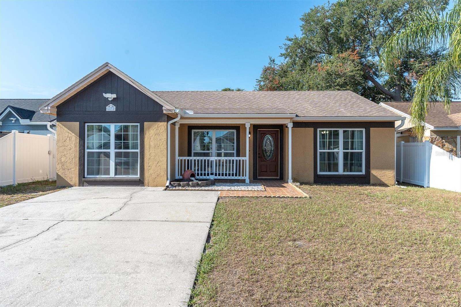 Virtually Staged. Welcome home to Logan Gate Village, where move-in ready comfort, thoughtful updates, and a convenient Tampa location come together with NO HOA. This beautifully updated 3-bedroom, 2-bathroom home features a remodeled kitchen completed in 2022 with stainless steel appliances, a center island, and a window above the sink overlooking the backyard. Additional updates include remodeled bathrooms in 2022, tile flooring updated in 2022, engineered hardwood flooring in the bedrooms, a NEW HVAC system and water heater in 2025, windows updated between 2012–2015, a roof replaced in 2017, French doors, and exterior patio/flat roof improvements completed in 2015. The home also offers attic storage with stairs, a backyard shed, and a water softener for added convenience. Logan Gate Village is known for its welcoming neighborhood feel and charming community features, including a scenic pond and playground near the entrance for residents to enjoy. Ideally located near highly rated schools, Citrus Park Mall, the Upper Tampa Bay Trail, Veterans Expressway, Tampa International Airport, Raymond James Stadium, shopping, dining, and just a short drive to the Gulf beaches, this home offers both everyday convenience and the best of Florida living. Opportunities like this do not come along often — move-in ready living in a desirable location with NO HOA. Schedule your private showing today!