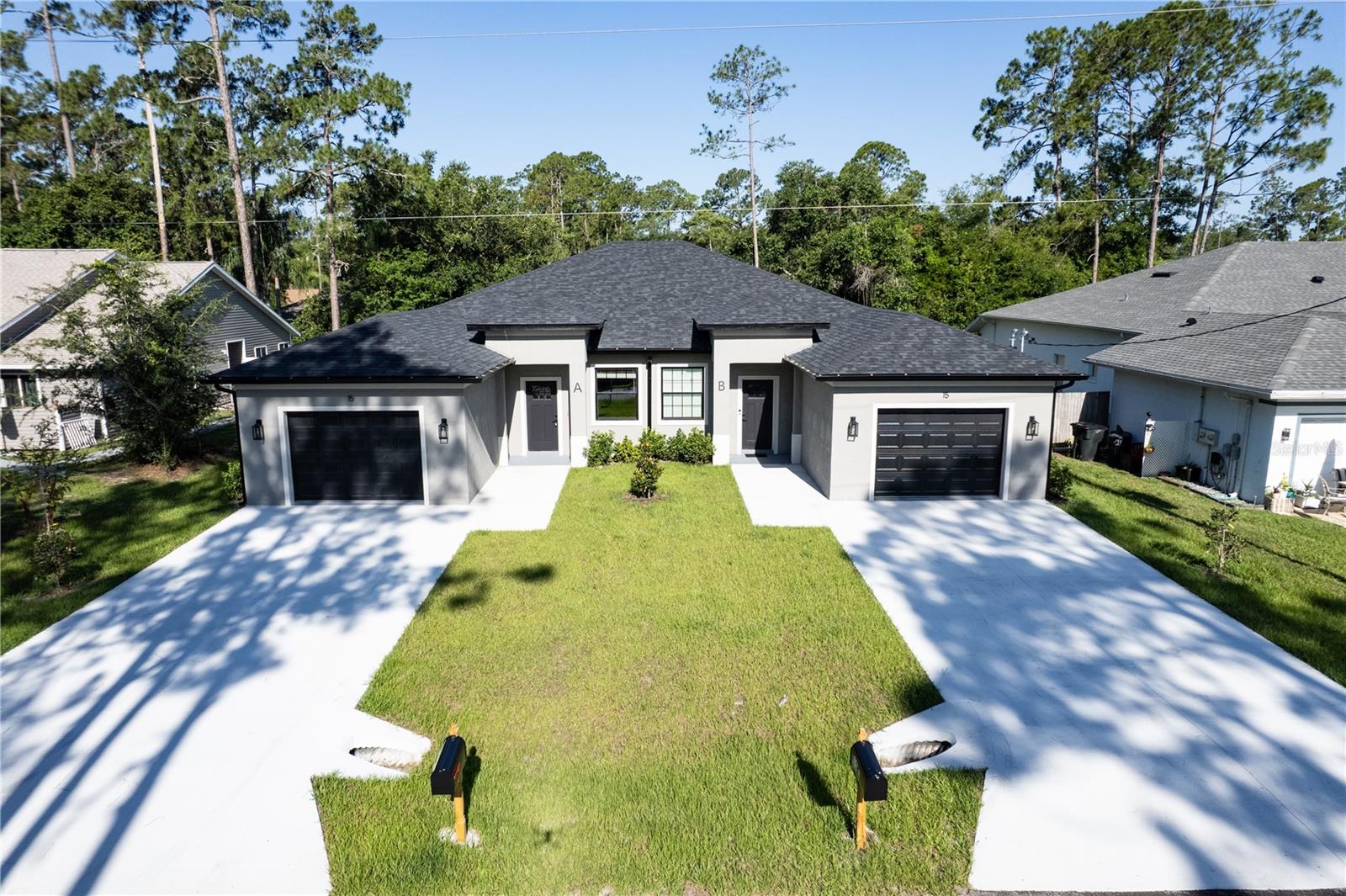 Brand-new 2026 duplex in the desirable Pine Lakes area of Palm Coast. Each unit features 3 bedrooms, 2 bathrooms, an openconcept design, porcelain tile flooring throughout, a stylish kitchen with backsplash, indoor laundry hookups, and a screened rear porch for yearround outdoor enjoyment. Thoughtfully designed to maximize comfort, functionality, and privacy, this property is ideal for homeowners, multigenerational living, or investors. Conveniently located near schools, shopping, dining, golf courses, medical facilities, parks, and scenic walking
and biking trails, with easy access to I-95 and just a short drive to Flagler Beach. A versatile property offering both income potential and modern living. Schedule your showing today.