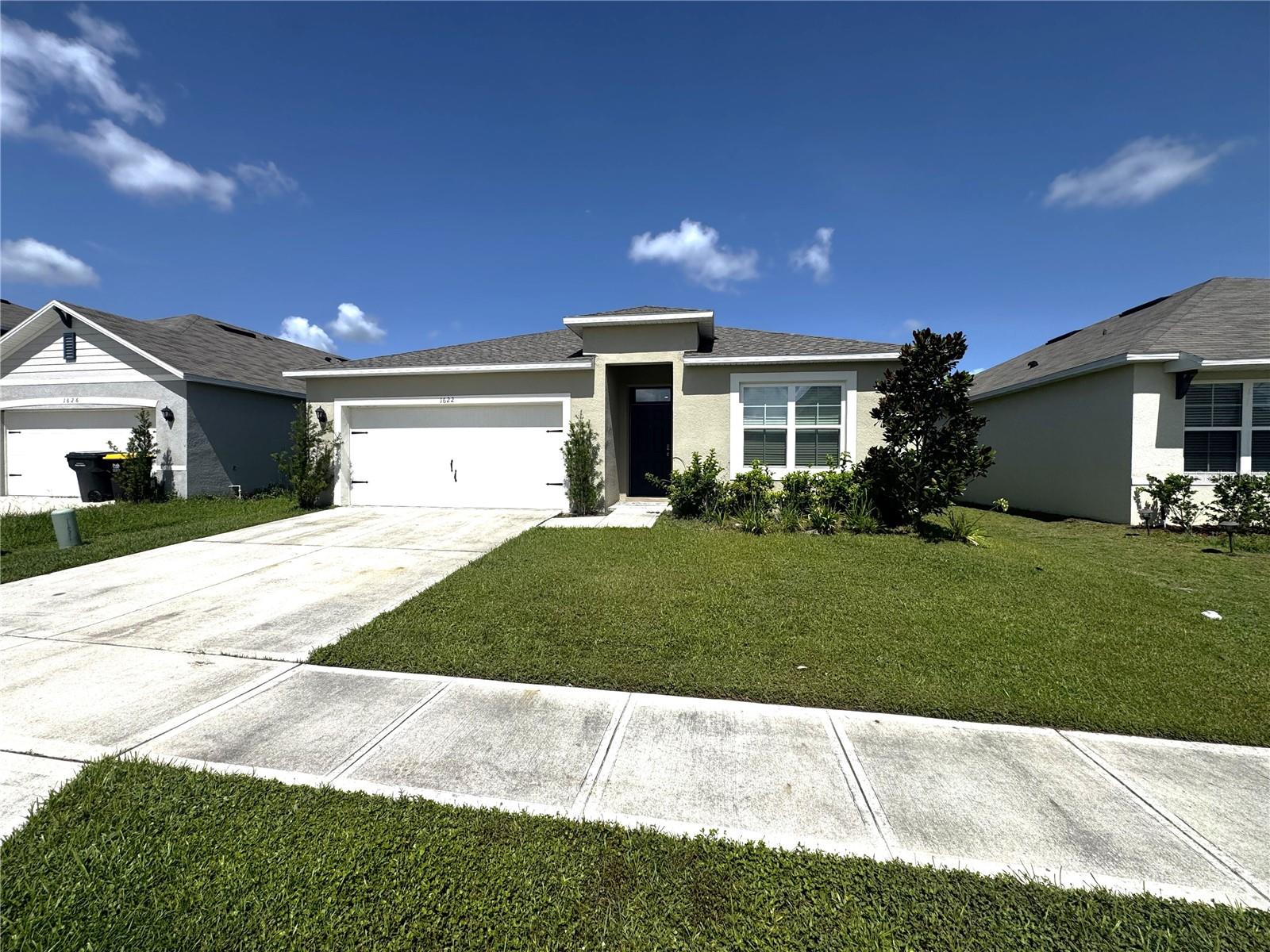 Welcome to this beautifully maintained, fully furnished home offering the perfect blend of comfort, style, and convenience. This spacious residence features an open-concept floor plan with bright living spaces, a modern kitchen equipped with stainless steel appliances, ample cabinetry, and a breakfast bar ideal for casual dining. Conveniently located just minutes from major highways, shopping, dining, golf courses, and world-famous theme parks, this home offers the perfect combination of comfort and convenience. Move-in ready and fully furnished—just bring your suitcase!