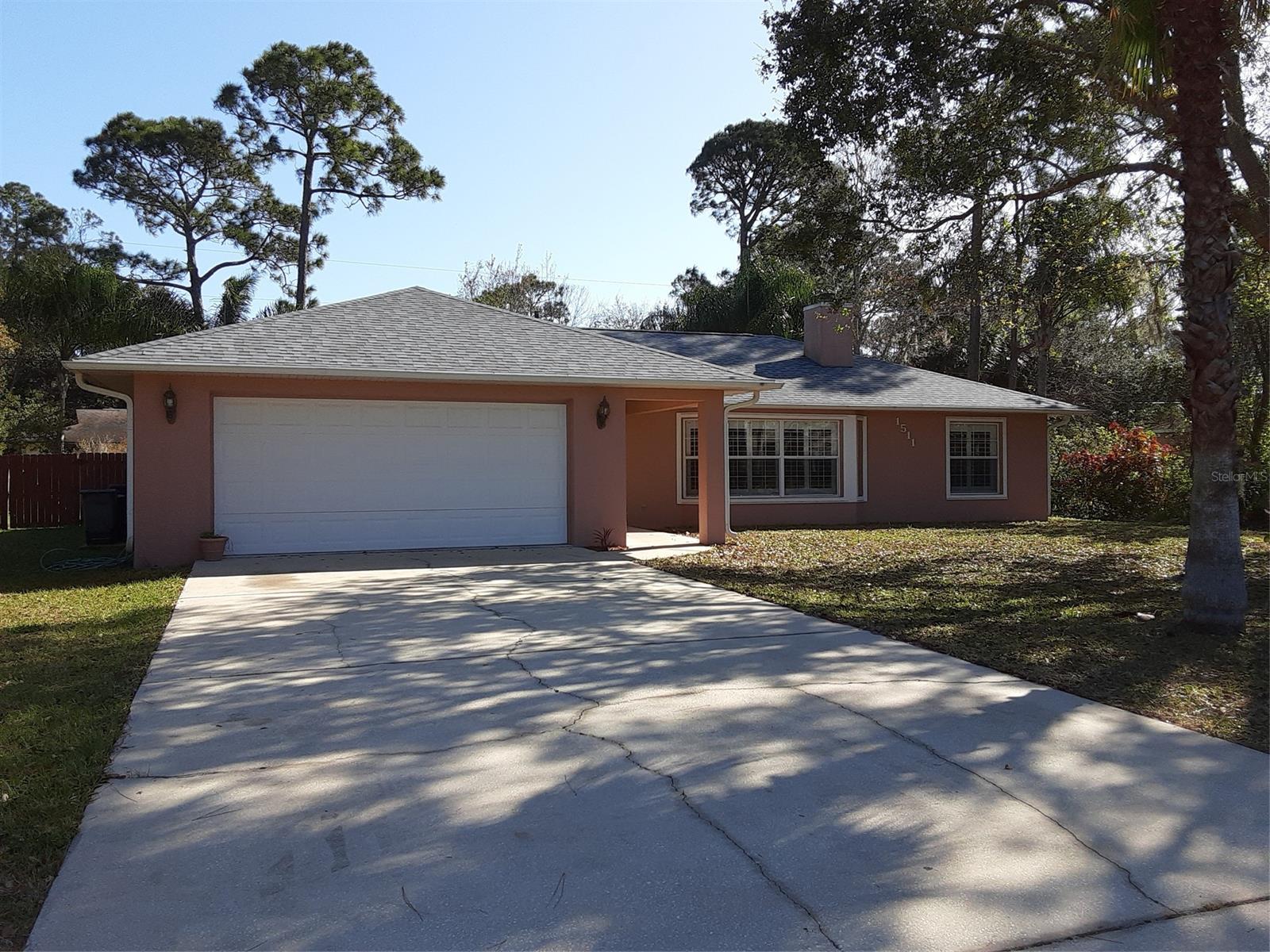 Situated on a triple lot, this solid block construction offers so much for the family starting out or retirees looking to relax and settle down. This home offers an open style design with volume ceilings, island style kitchen with newer SS appliances. The inside laundry room is an added bonus along with the flex room which could be used as an office or workout area.The plantation shutters compliment the existing windows in the Living room and front bedroom. Enjoy the gentle breezes from the screened lanai and extra patio for those Summer BBQ's, plenty of room for a future pool in the back yard as well. Recent upgrades include new roof Feb. 2020, new HVAC 2016,appliances 2015. Owner is a Lic FL RE  All information deemed correct but not warranted, Easy to show with a short notice. ;Water: City