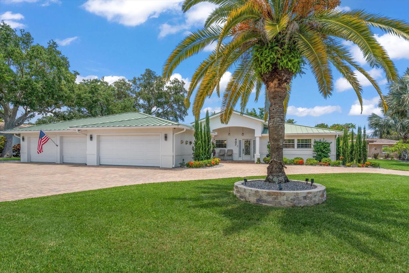 Luxury, style, and effortless living come together in this sprawling ranch designed to impress at every turn and perfectly nestled in the highly desired Harbor Bluff's community. Just minutes from the breathtaking Gulf Beaches.  From the moment you step into the elegant formal foyer, you'll appreciate the impeccable craftsmanship, designer finishes, and thoughtfully curated spaces throughout. At the heart of the home is a spectacular chef's kitchen featuring custom cabinetry, professional-grade appliances, an oversized island with seating, and a walk-in butler's pantry that offers exceptional storage. The expansive dining room is perfect for hosting unforgettable gatherings, while the breathtaking family room is filled with natural light and showcases sweeping views of your private outdoor retreat. Step outside to your own resort-style oasis, where a massive screened lanai surrounds a freshly refinished pool and multiple outdoor living and entertaining areas—creating the perfect setting for relaxing, dining, or enjoying Florida's year-round sunshine. The luxurious primary suite is truly one of a kind, offering a peaceful retreat complete with a spa-inspired bath designed for ultimate relaxation. Every inch of this remarkable home has been thoughtfully renovated with high-end finishes and timeless design, delivering the perfect blend of sophistication, comfort, and modern living. Additional highlights to include: 4 car garage (car enthusiast dream), irrigation system, interior and exterior security systems and the list goes on! This is more than a home—it's a lifestyle. The listing agent is the owner. Furniture is available for purchase separately. Schedule your private showing today!