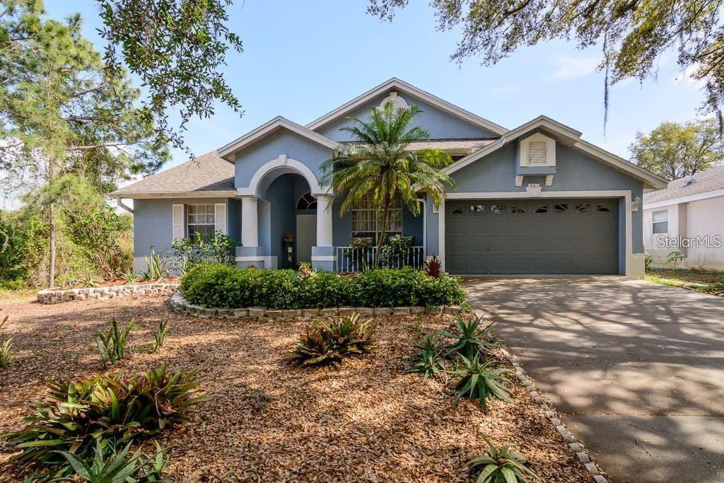 Gorgeous 3-bedroom, 2-bath, 2-car garage home in Tarpon Springs located in the desirable Westwinds Community! From the impressive double-door entry to the soaring ceilings and tile flooring throughout, this home offers both style and functionality.  The spacious floor plan features a separate living and dining room combination with a seamless flow that's perfect for everyday living and entertaining. The large updated Granite kitchen is equipped with stainless steel appliances, including a newer refrigerator, and opens to the inviting family room complete with a cozy wood-burning fireplace.  The split-bedroom layout provides privacy, with a generous primary suite featuring double sinks, a separate soaking tub, and a walk-in shower. The secondary bedrooms are spacious and share a convenient Jack-and-Jill bathroom. Additional highlights include an inside utility room, abundant natural light, and plenty of storage.  Major updates include a 2018 roof and 2022 AC, offering peace of mind for years to come.  Enjoy exceptional privacy in this beautiful home featuring a secluded backyard with no rear neighbors and no neighbors on the left side.  Walk or Bike to Pinellas County Trail, Beaches and the new Aldi Supermarket!  Don't miss this opportunity to own a beautiful home in a sought-after neighborhood close to shopping, dining, schools, and more!  Call Today for your Private Showing!