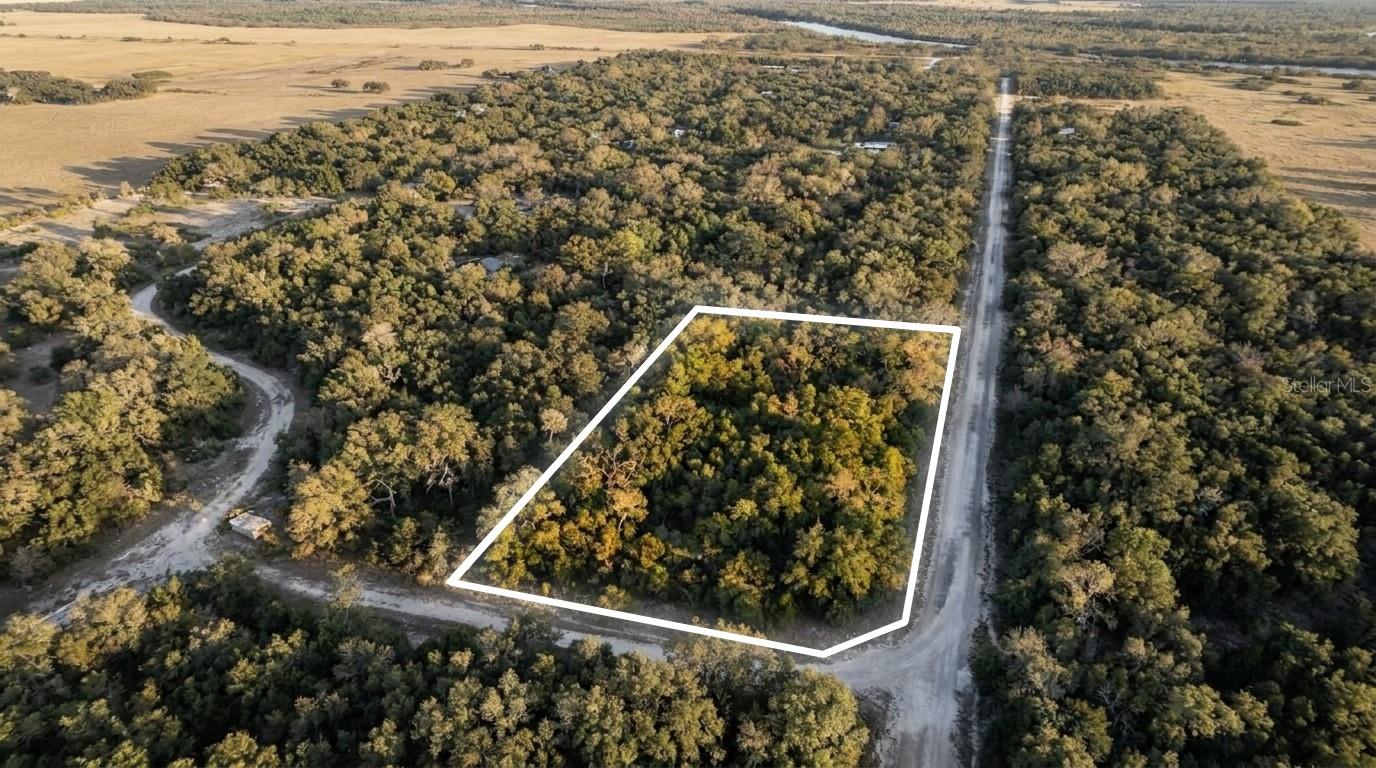 Discover a unique opportunity on this 1.28-acre parcel, ideal for
outdoor enthusiasts seeking a serene getaway without HOA or deed
restrictions.