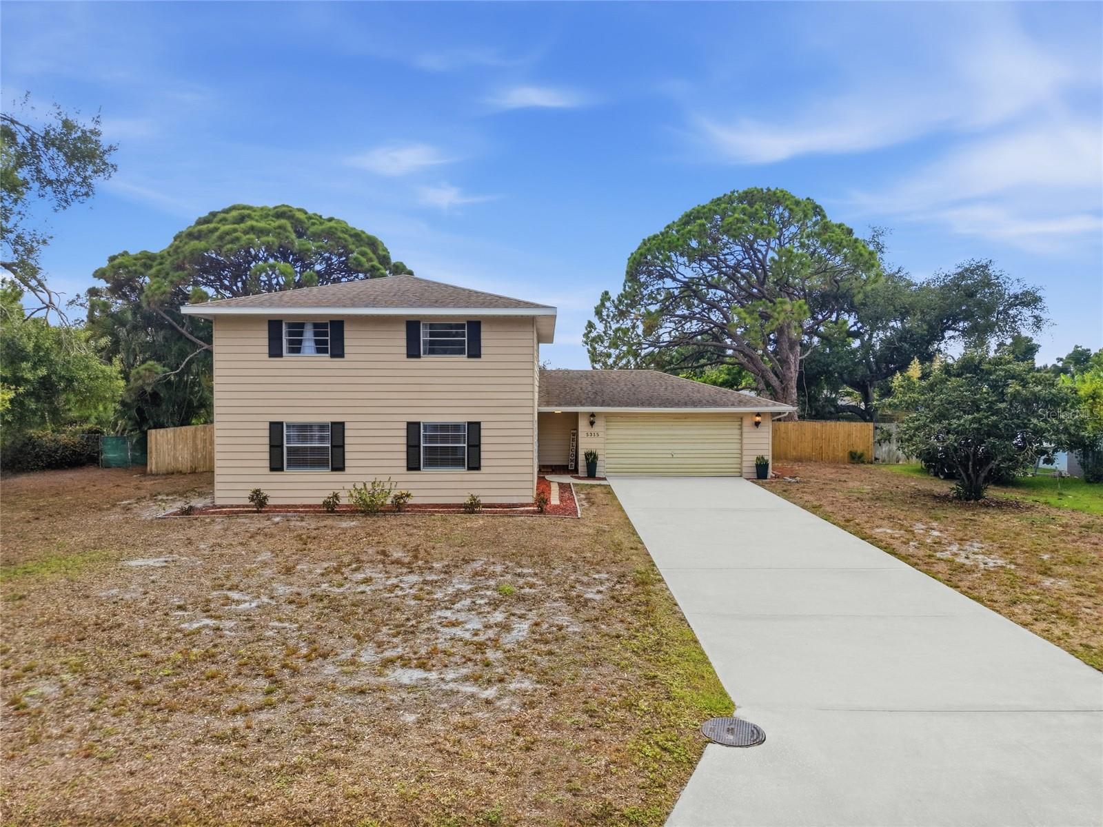 RARE OPPORTUNITY IN THE HEART OF WEST BRADENTON! Welcome to this spacious 4-BEDROOM, 2.5-BATH home tucked away on a quiet CUL-DE-SAC and situated on NEARLY A HALF-ACRE in the highly desirable 34209 zip code! Located within an A-RATED SCHOOL ZONE, WALKING DISTANCE TO BRADENTON COUNTRY CLUB, and just 10 MINUTES TO THE GULF BEACHES, this home offers the perfect combination of space, location, and lifestyle.

Families will love the oversized yard with endless possibilities for entertaining, pets, a future pool, or simply enjoying the Florida sunshine. FOR ADDED PEACE OF MIND, THE HOME WAS RE-ROOFED IN 2017.

Conveniently located you’ll also be just minutes from shopping, restaurants, parks, medical facilities, and everyday conveniences while still enjoying the privacy of an established neighborhood.

HOMES LIKE THIS RARELY HIT THE MARKET—Whether you’re looking for room to grow or searching for your forever home in one of Bradenton’s most sought-after areas, this is an opportunity you won’t want to miss.
SCHEDULE YOUR PRIVATE SHOWING TODAY BEFORE IT’S GONE!