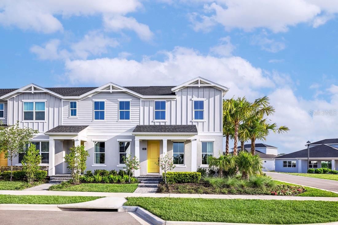 This stunning Rinker Farmhouse townhome offers luxurious modern finishes, designer-selected furnishings, and a spacious, highly functional layout with 3 bedrooms, 2.5 bathrooms, a flex room, and a loft. An inviting covered porch welcomes you into a bright foyer with views of the flex room, ideal for a home office, sitting area, or additional living space. The open-concept great room and casual dining area flow seamlessly to the courtyard, creating an ideal setting for everyday living and entertaining. The gourmet kitchen is beautifully appointed with a large center island with breakfast bar seating, abundant counter and cabinet space, and a spacious pantry. Upstairs, the impressive primary suite features a generous walk-in closet, luxe shower, and private water closet. Secondary bedrooms havesizable closets and share a well-designed hall bath with linen storage, all centered around a versatile loft. Additional highlights include a convenient powder room, centrally located laundry, extra storage, and the added privacy and natural light of a desirable Toll Brothers home.