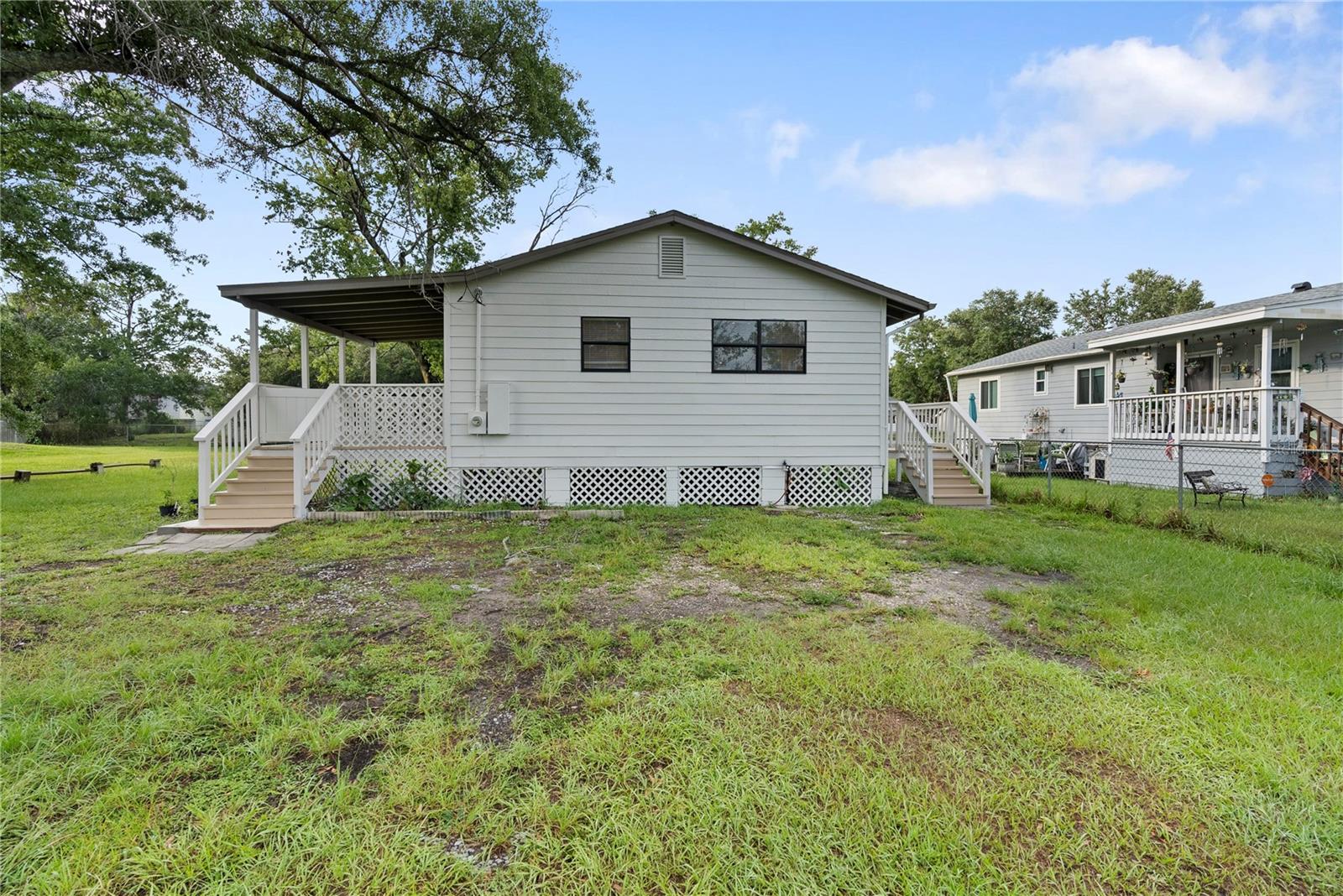 Welcome to 1707 1st St, Orlando, FL 32824 — a beautifully renovated home with modern finishes, thoughtful upgrades, and No HOA. This move-in-ready property features a large covered front porch & sice deck, brand-new roof, new luxury vinyl plank flooring throughout, fresh interior and exterior paint, updated fixtures, and a fully renovated bathroom.

The refreshed kitchen is designed with style and functionality in mind, showcasing new quartz countertops, new stainless steel appliances, and a clean modern look. Enjoy relaxing on the charming front porch, or take advantage of the large backyard, offering plenty of space for outdoor entertaining, pets, gardening, storage, or future possibilities.

Conveniently located near major roadways, shopping, dining, Orlando International Airport, and all that Central Florida has to offer, this home is a great opportunity for homeowners and investors alike. With major updates already completed and no HOA restrictions, this property is ready for its next owner.