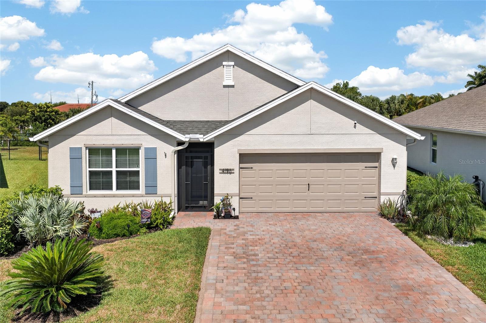 MODERN LIVING IN THE GATED RIVER CLUB COMMUNITY! Welcome to this beautifully maintained 2021-BUILT 4 BEDROOM, 2 BATHROOM HOME located in the highly desirable River Club community of Punta Gorda. Offering a spacious layout, stylish finishes, and exceptional indoor and outdoor living spaces, this home is perfectly suited for families, seasonal residents, or anyone looking to enjoy the Florida lifestyle.

Step inside to discover a bright, open-concept floor plan designed with both comfort and functionality in mind. Tile flooring throughout the main living areas creates a seamless flow, while tasteful lighting fixtures and abundant natural light add warmth and modern appeal throughout the home.

At the heart of the home, the spacious kitchen is designed to impress with quartz countertops, stainless steel appliances, ample cabinetry, generous counter space, and a large center island that provides the perfect gathering place for family meals, entertaining guests, or casual dining. The kitchen opens effortlessly into the dining and living areas, creating an inviting space ideal for everyday living.

The spacious primary suite serves as a private retreat, featuring an oversized walk-in closet and a well-appointed ensuite bathroom with plenty of room to unwind after a long day. Three additional bedrooms provide flexibility for family, guests, or a home office, with one guest bedroom featuring a convenient Murphy bed that maximizes functionality while maintaining valuable floor space.

Step outside to enjoy your own private backyard oasis. The large screened lanai provides an ideal setting for relaxing, entertaining, or enjoying Southwest Florida's beautiful weather year-round. The hot tub, which is included with the home, creates the perfect place to unwind, while the fully fenced backyard offers privacy and space for pets, children, or outdoor activities.

As a bonus. This home has a LOMR FEMA Flood exception, putting it out of the flood zone. No flood insurance required.

Residents of River Club enjoy the added benefits of a gated community, along with access to a community pool and playground, creating a welcoming neighborhood atmosphere for all ages.

Conveniently located near shopping, dining, schools, medical facilities, I-75, historic downtown Punta Gorda, and Charlotte Harbor, this home offers easy access to everything Southwest Florida has to offer while providing the peace of mind of a newer construction home.

DON'T MISS YOUR OPPORTUNITY TO OWN THIS BEAUTIFULLY APPOINTED HOME IN ONE OF PUNTA GORDA'S MOST DESIRABLE GATED COMMUNITIES!