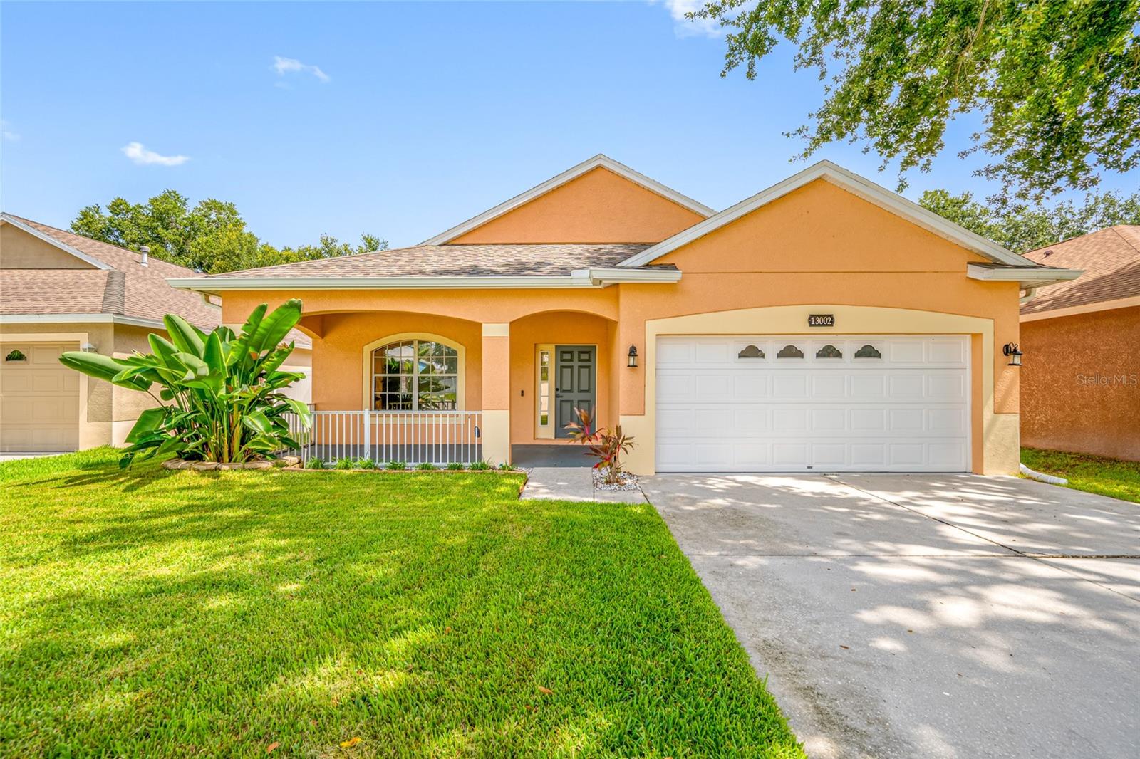 A rare opportunity! Move right into this beautifully updated 3-bedroom, 2-bath home with a 2-car garage in the highly desirable Hidden Oaks community of Temple Terrace. Thoughtfully renovated with quality finishes throughout, this home offers comfort, style, and peace of mind. The bright, open floor plan features soaring ceilings and NEW flooring throughout. The remodeled kitchen showcases antique white cabinetry, a stylish glass tile backsplash, granite counters, newer appliances, and a sought-after gas range. Primary bedroom offers a MASSIVE closet ! Updated electrical outlets with built-in USB ports add modern convenience. Enjoy the confidence of major recent upgrades, including a NEW HVAC system with a transferable warranty, a NEW gas water heater, and a newer roof—allowing you to move in without the worry of costly repairs for years to come. Step outside to a beautifully maintained St. Augustine lawn with an irrigation system, plus covered front and back patios that provide the perfect spaces for relaxing or entertaining. Fully fenced for privacy in the back yard. Conveniently located near shopping, dining, parks, major highways, great school systems, and the University of South Florida, this exceptional home combines modern updates with everyday convenience. Don't miss this rare opportunity to own a truly move-in ready home in Hidden Oaks! With all of these amenities what more could you ask for! Hurry it won't last long.
