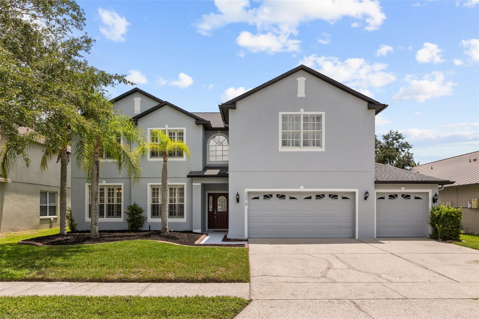 Welcome home to the highly sought-after guard-gated Preserve at Eastwood Community! This  6-bedroom, 4-bath pool home offers 3,241 square feet of thoughtfully designed living space and the perfect blend of comfort, flexibility, and Florida lifestyle living.

Recent updates provide peace of mind and modern appeal, including a 2016 roof, fresh interior and exterior paint, new gutters, new landscaping, new water heater, freshly painted pool deck, and new luxury vinyl plank flooring throughout the second floor. Plantation shutters throughout the home add timeless elegance and charm.

Designed for both everyday living and entertaining, the flexible floor plan features formal living and dining rooms, a spacious family room, and a first-floor bedroom that can easily serve as a home office, guest suite, playroom, or flex space.

The heart of the home is the well-appointed kitchen showcasing granite countertops, stainless steel gas appliances, abundant cabinetry, and a breakfast nook that opens seamlessly to the family room and outdoor living area.

Step outside to your private backyard retreat where an expansive covered lanai overlooks the sparkling screened pool and fenced backyard, creating the ideal setting for relaxing, entertaining, or enjoying year-round Florida sunshine.

Upstairs you'll find a desirable split-bedroom layout including two spacious primary suites, three additional bedrooms, a bonus computer nook, and a conveniently located laundry room. The owner's suite serves as a private escape featuring a large sitting area, tray ceiling, dramatic double-door entry, and a spa-inspired bath with a seamless glass shower.

Residents of Eastwood enjoy an exceptional amenity package including, tennis courts, Pickle Ball, Basketball courts, community pool, playgrounds, walking trails, conservation areas, basic cable, and available RV storage for an additional fee.

Conveniently located in the heart of East Orlando, just minutes from top-rated schools, Waterford Lakes Town Center, UCF, major employers, dining, shopping, and major highways, this home offers the perfect combination of space, updates, amenities, and location.

Don't miss this opportunity to own a beautiful  pool home in one of East Orlando's most desirable communities.