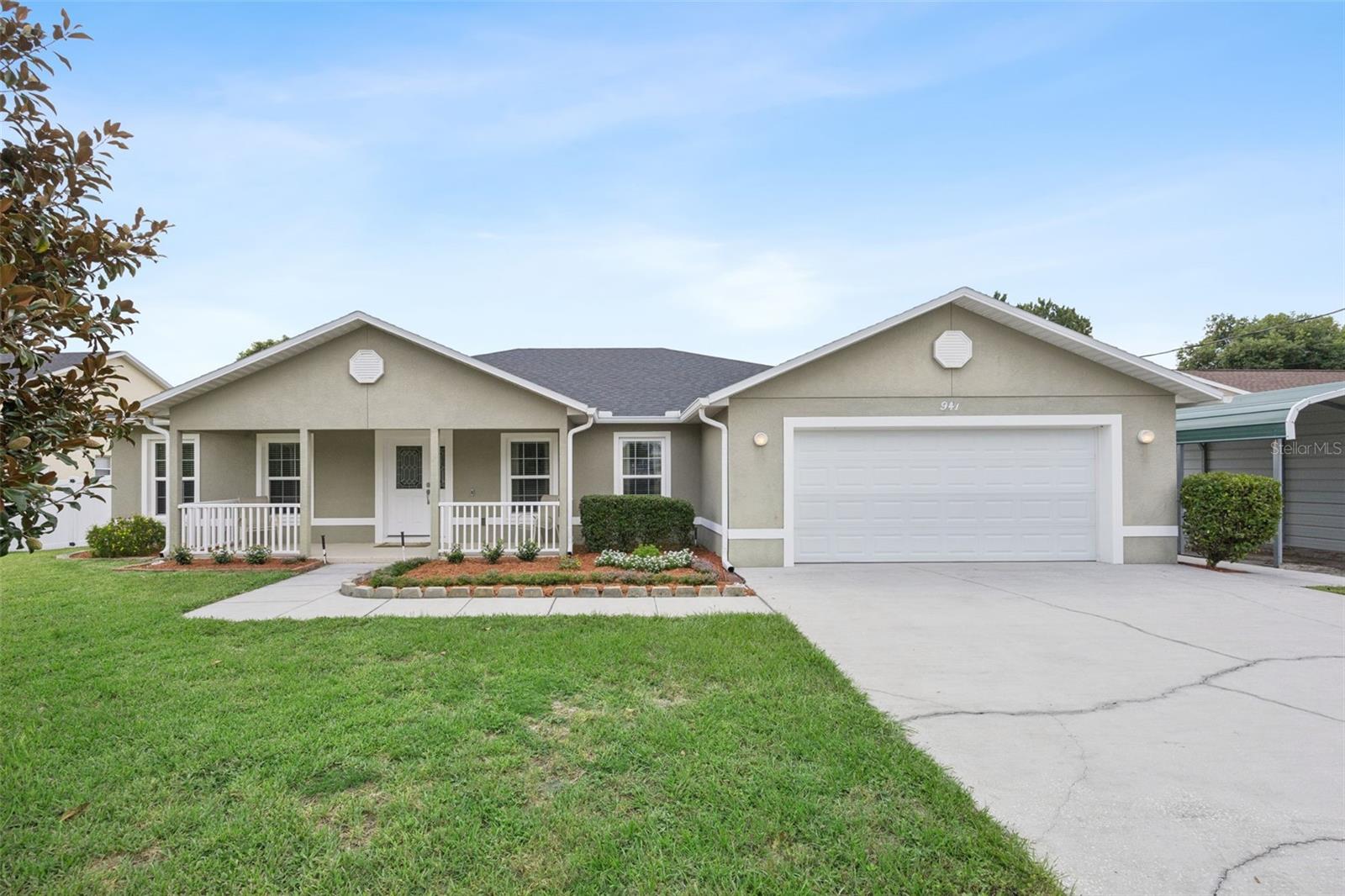Welcome home to this beautifully crafted custom residence, built in 2014 and perfectly blending timeless design with modern comfort. Featuring 3 bedrooms, 2.5 bathrooms, a sparkling private pool, and coveted access to Lake Mills, this 1,944-square-foot home offers the ideal setting for both everyday living and effortless entertaining.

Step inside to an open, light-filled floor plan where custom tray ceilings, elegant finishes, and spacious living areas create a warm and inviting atmosphere. The thoughtfully designed layout includes a sunny breakfast nook overlooking the backyard, a separate formal dining room for hosting family and friends, and tile flooring throughout the main living spaces with cozy carpet in the bedrooms.

The heart of the home is the beautifully appointed kitchen, complete with granite countertops, 42-inch cabinets, and plenty of space for gathering. In addition, there is extra storage hidden in the hallway. The spacious primary suite overlooks the pool and serves as a private retreat, featuring dual vanities, a large walk-in tiled shower, his and hers closets, and custom ceiling details that add an extra touch of luxury.

Step outside to your own private backyard oasis, complete with a covered lanai and screened pool - perfect for relaxing on warm Florida days or entertaining family and friends. The spacious backyard offers plenty of room for games, activities, and making memories for years to come. And with access to picturesque Lake Mills, you'll have even more opportunities to enjoy boating, fishing, kayaking, or simply taking in the natural beauty of one of Central Florida's hidden gems.

This home has been meticulously maintained with numerous valuable updates, including a new roof installed in 2024, a refrigerator replaced in 2021, a microwave replaced in 2022, and a dishwasher replaced in 2020. The septic system was pumped in January 2026, when both the septic pump and aerator were also replaced. The pool's salt cell was replaced in January 2026, and the primary bedroom carpet was replaced in 2024. An additional one-car carport was added in 2017, providing extra covered parking and storage.

If you've been searching for a move-in-ready custom home that offers quality craftsmanship, thoughtful upgrades, and the best of Florida living, this is one you won't want to miss. Schedule your private showing today!