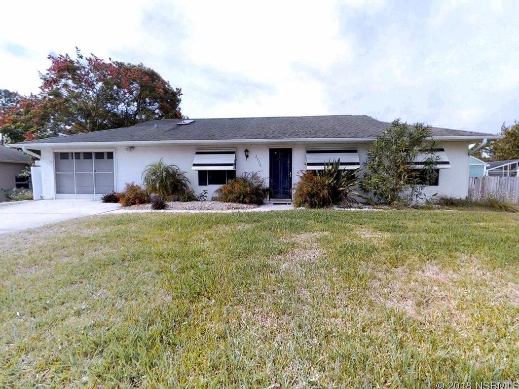Relax and enjoy coastal living at its best in this well-maintained Florida Shores home.  This home with large one car garage offers a 3 bedroom 2 bath split plan with open living and dining areas, a 19 x 9 Florida room plus a screen porch too.   The master suite has a generous walk in closet and a separate vanity/dressing area. The master bathroom has a jetted garden tub, double vanities and walk in shower.  New carpet, interior paint, hot water heater and more â¦ Large yard with mature landscaping, close to shopping, restaurants, elementary school, and I-95 as well as the beach, river and parks.  This one is a must see! ;Water: City