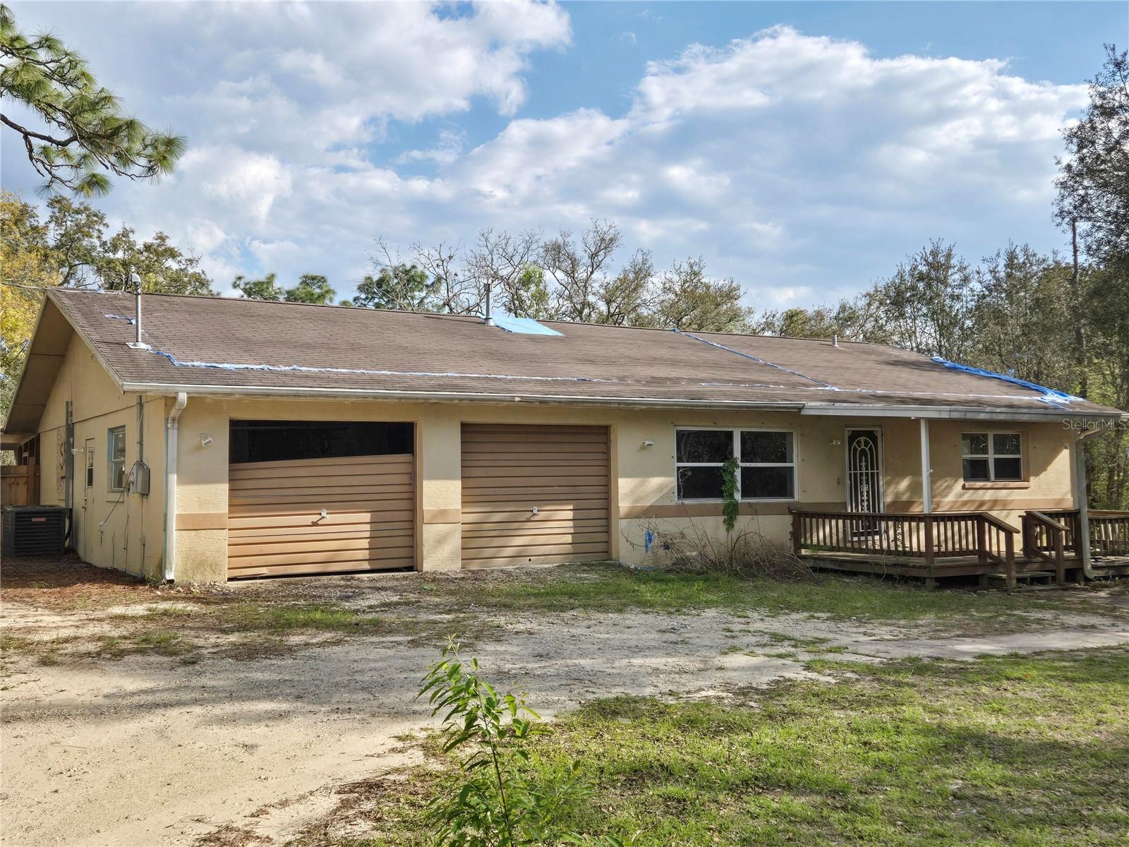 Auction Property. 3/2/2 on 3/4 acre private gated road.