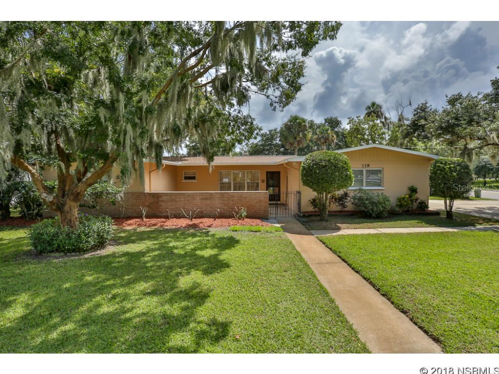Situated in the charming and desirable Downtown area of New Smyrna Beach, this 3 bedroom 2 bath concrete block home is exactly what you have been looking for!!  Wake up in the morning with a walk along historic Riverside Dr.  While out, stop by the vibrant NSB Farmers market.  Enjoy the convenience of shopping, dining, yoga and all that the historic Canal St has to offer.  Your  large living room and added family room, gives you plenty of room to grow.  The large corner lot, with shady oak trees is waiting for your backyard oasis or family pool to begin.  This immaculate home has pristine and stylish Terrazzo floors under the well kept carpet.  The master bedroom has a walk in closet and an ensuite master bath.  No worries about the roof as this one is brand new, installed March this year.  Updated windows, electric panel and propane whole home generator are only a few of the amazing features this home offers.  Oversized side entry 2 car garage for you cars and toys. Be a at the beach or I-95 in less than 10 minutes.  Isn't it time you start "Living the Dream" here in New Smyrna Beach. ;Water: City