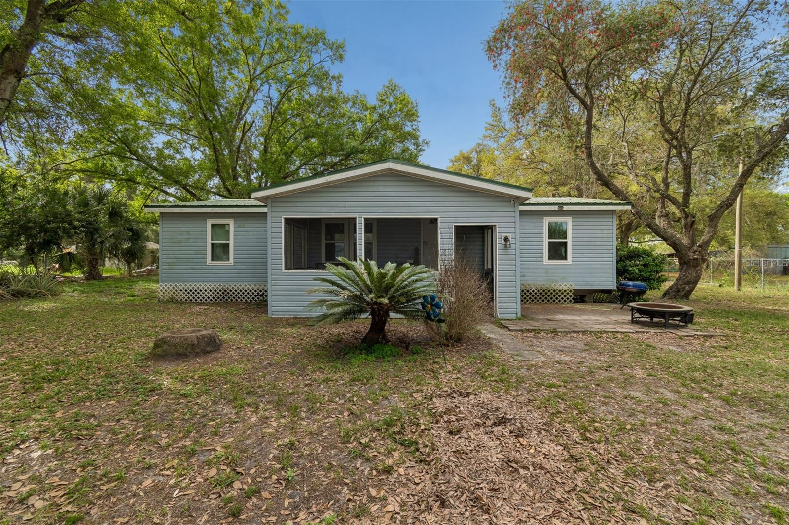 PRICE REDUCED! Welcome to 4505 Estate Dr, Plant City, FL 33567! This beautifully updated 3-bedroom, 2-bath plus 1 bonus room doublewide manufactured home offers 1,434 square feet of comfortable living space and sits on a spacious 0.38-acre lot fully enclosed with a chain link fence. Perfect for pets, privacy, and outdoor enjoyment.

The home was remodeled in 2021 with a brand new kitchen, updated bathrooms, water heater, and upgraded electrical, giving it a fresh, modern feel. Additional major updates include a new well pump installed in 2021, a new A/C system in 2022, and new windows in 2025. The home has a durable metal roof approx. 10 years old, which adds extra peace of mind, known for its longevity and low maintenance.

Inside, you'll find a functional layout with an interior laundry room and comfortable living spaces ideal for everyday living. Step outside to enjoy the large backyard with plenty of room for gardening, entertaining, or relaxing, plus a convenient storage shed for tools and equipment.

With its generous lot size, numerous upgrades, and quiet Plant City location, this property is a great opportunity for homeowners or investors alike. Call today to schedule your private showing!