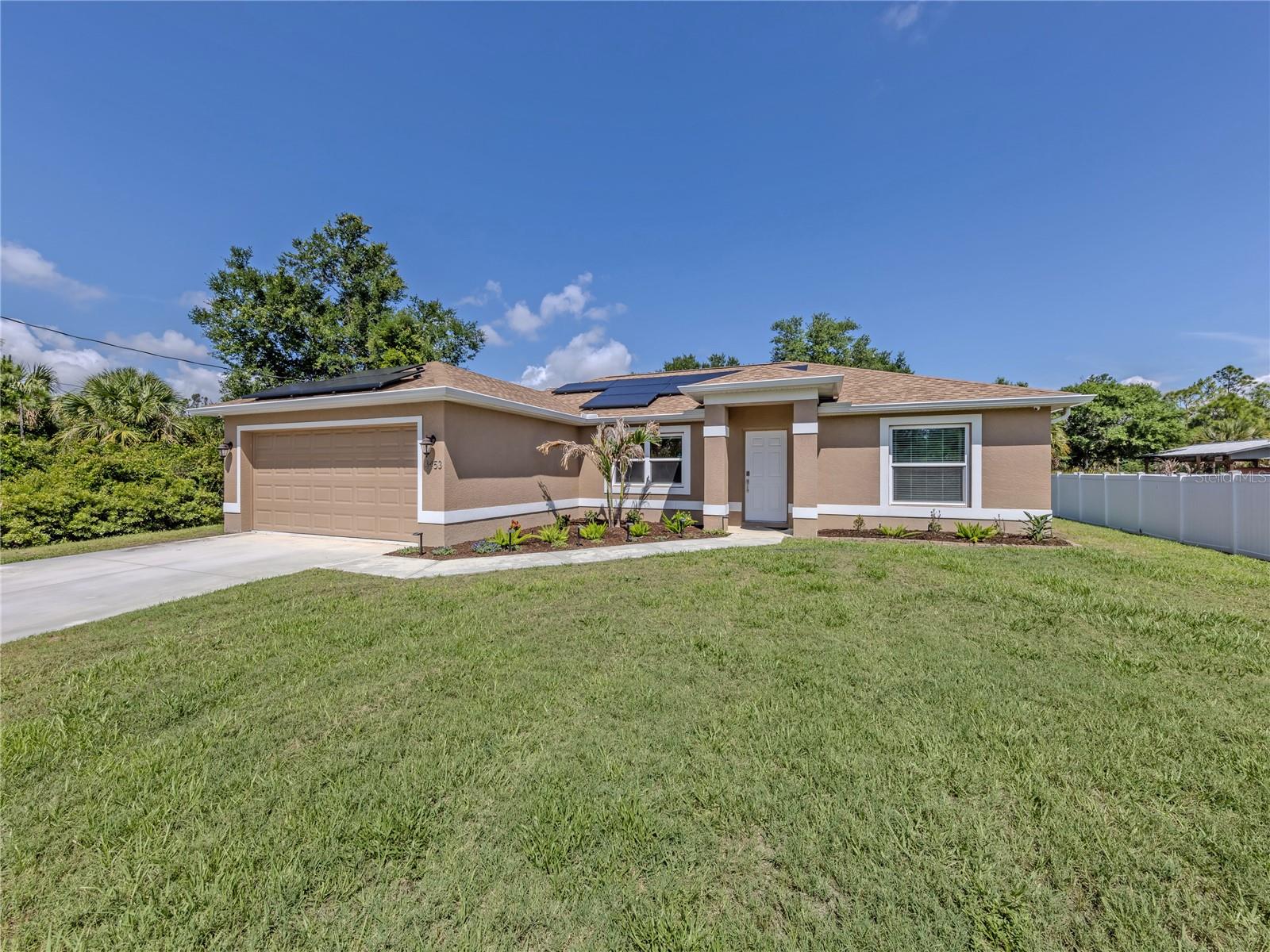 Welcome to this beautifully maintained 3-bedroom, 2-bath single-family home built in 2021 by GULFSTAR, For the new homeowers peace of mind the home comes with IMPACT windows and fully PAID OFF solar panels that help keep electric bills low and energy efficiency high.
Home is designed with comfort and functionality in mind, it features a desirable split-bedroom floor plan, with abundance of natural sunlight throughout the entire home. As you step inside you will find, fully tiled flooring throughout, creating a clean and cohesive look that is both stylish and easy to maintain. The spacious living and dining areas showcase vaulted ceilings, adding to the open and airy feel of the home.
The island-centered kitchen is perfect for entertaining and everyday living, featuring dual sinks, granite countertops, ample upgraded kitchen cabinetry for extra storage, and a brand new whole-house water softener system.
The private Master suite offers a relaxing retreat with walk-in closets and an en-suite bathroom complete with matching dual granite vanities and a fully tiled walk-in shower with glass door. 
Enjoy Florida living year-round from the screened lanai overlooking a beautifully landscaped yard with mature trees. 
North Port Florida is the 2nd fasting growing location in the United States, Conveniently located near, highways, shopping, dining, parks, golf courses, and Gulf Coast beaches, this move-in-ready home combines quality construction, modern features, and everyday comfort, so be sure to put this one on your list!!!