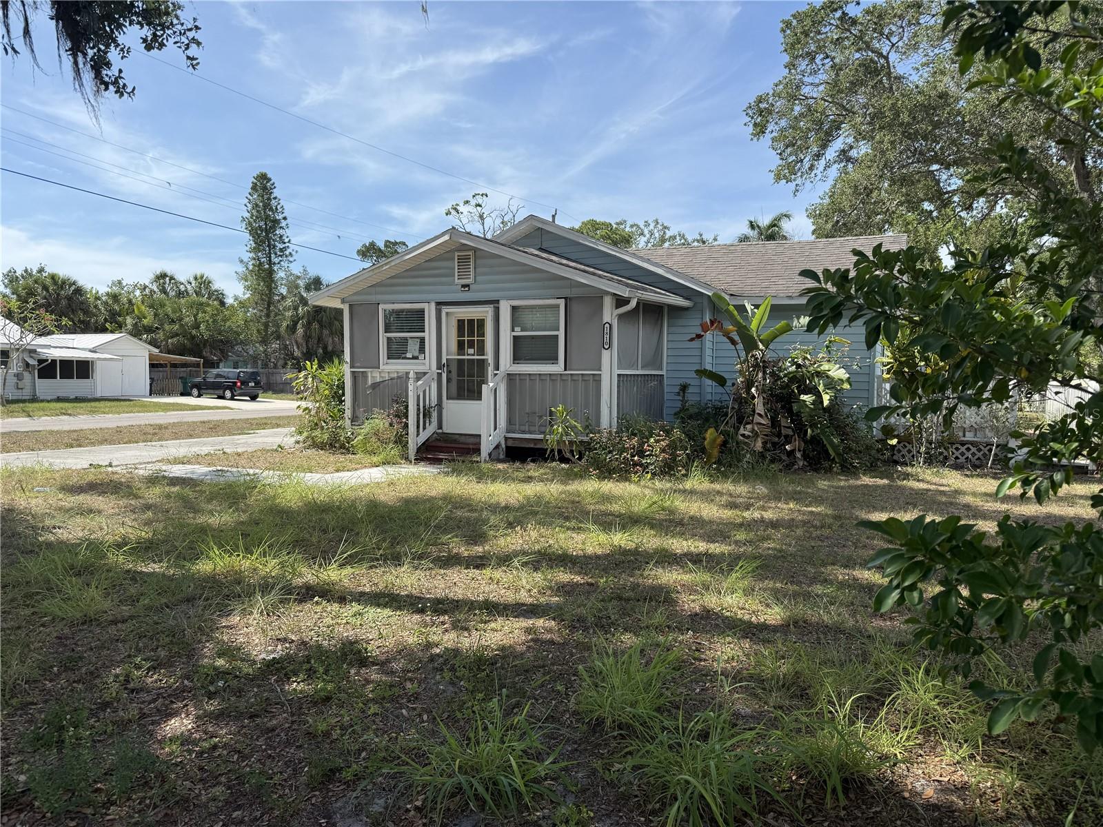 Discover the possibilities with this charming 2-bedroom, 2-bath home situated on a rare double corner lot in Palmetto. Whether you're looking for extra space to expand, add a workshop, create an outdoor retreat, or simply enjoy a larger homesite, this property offers exceptional flexibility. A welcoming screened front porch sets the tone, providing the perfect spot to enjoy your morning coffee, unwind in the evening, or take in Florida's year-round sunshine and breezes. Inside, you'll find a bright, open living space filled with natural light. The thoughtfully designed kitchen features granite countertops, a modern range hood, generous cabinetry, and ample workspace for everyday living or entertaining. The open layout flows seamlessly into the living area, creating a comfortable and inviting atmosphere for family and guests alike. Outdoor enthusiasts will appreciate the room to accommodate boats, RVs, and recreational equipment without sacrificing yard space. The expansive double lot opens the door to countless possibilities, from a future pool and garden to additional storage or hobby space. Conveniently located in Palmetto, this property combines comfort, functionality, and opportunity in one unique package. If you've been searching for a home with room to grow and the freedom to make it your own, this is one you won't want to miss. This is a HUD-owned home (case #098-122445). Equal Housing Opportunity.