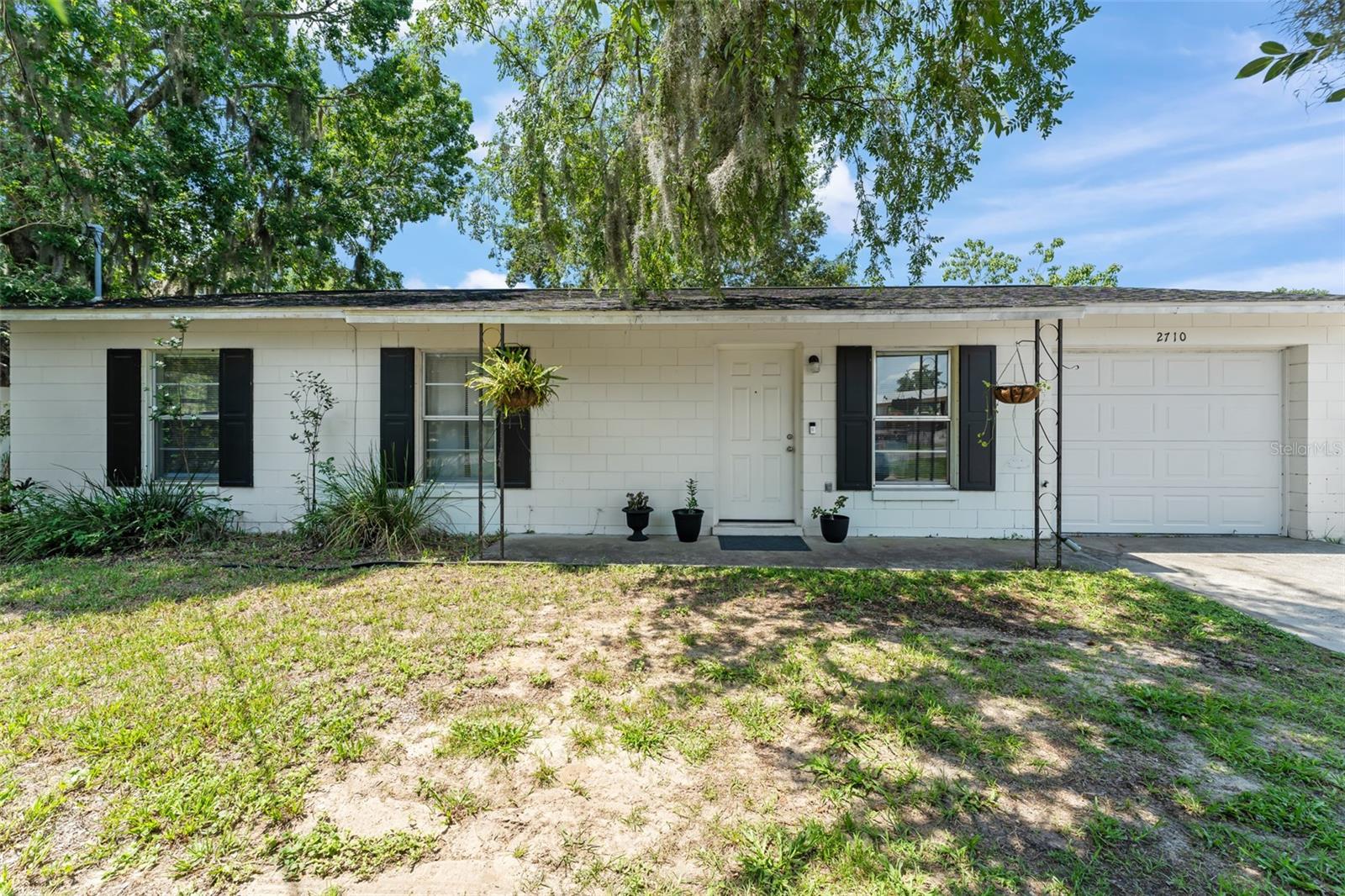 One or more photo(s) has been virtually staged. **This house comes with a REDUCED RATE through the seller's preferred lender. This is a lender-paid rate buydown that reduces the buyer's interest rate and monthly payment.**

Welcome to 2710 W County Road 44 in Eustis, a 3-bedroom, 2-bath home offering an open floorplan and comfortable living spaces. The layout is designed for everyday function, with the main living, dining, and kitchen areas connected to create an easy flow for relaxing, hosting, and daily routines.

Inside, the open floorplan gives the home a practical and welcoming feel, with shared spaces that can be arranged to fit a variety of needs. The 3-bedroom layout offers flexibility for residents, guests, a home office, hobby room, or additional storage, while the 2 full bathrooms provide convenience for everyday living.

Outside, the private yard adds outdoor appeal and offers a great opportunity for future personalization. Whether used for gardening, outdoor seating, pets, play space, or a custom backyard setup, the outdoor area gives the next owner room to shape the space around their lifestyle.

Located in Eustis, the home offers access to a laid-back Central Florida setting with nearby shopping, dining, parks, schools, lakes, and local conveniences. The area is known for its small-town feel, outdoor recreation, and proximity to surrounding Lake County destinations, including Mount Dora, Tavares, Leesburg, and major routes for commuting throughout the region.
