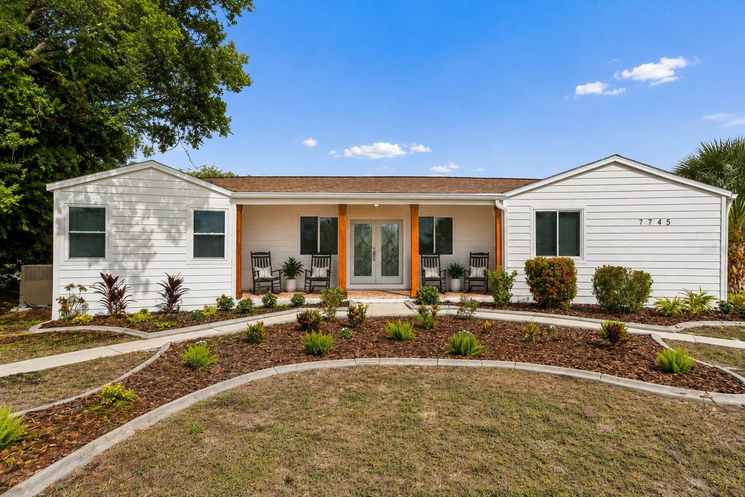 Virtually Staged. Classic Sarasota character meets a fresh, modern renovation on an oversized .39-acre homesite! This beautifully updated 3-bedroom, 2-bath home offers an open, flexible floor plan designed for both everyday living and entertaining. The welcoming front porch has a relaxing feel, melting the stress away while rocking on the covered porch. Step inside to the open floor plan with plenty of natural lighting. New gorgeous flooring. A spacious kitchen features white shaker-style cabinetry, stone countertops, stainless steel appliances, a large center island and abundant storage. This space is great for entertaining! The living room can accommodate a sectional sofa and more! All bathrooms have been updated with beautiful tile work in the showers.
Outside is where this property truly stands apart. The expansive fenced yard provides exceptional room to enjoy the Florida lifestyle, complete with a fire-pit gathering area, patio space and an oversized concrete parking area offering room for an RV, boat, trailer and multiple vehicles—a rare find for buyers who need space for their recreational toys.
The location puts you close to some of the best of the Sarasota area. Boaters can take advantage of nearby public water access, including Ken Thompson Boat Ramp and Centennial Park, while outdoor recreation and waterfront scenery await at Bayfront Park. Shopping, dining and entertainment options are abundant at University Town Center and the iconic St. Armands Circle. Sarasota's renowned beaches, downtown cultural attractions and waterfront destinations are also within easy reach.
Frequent travelers will appreciate convenient access to Sarasota Bradenton International Airport. With its updated interior, oversized lot, expansive outdoor space and exceptional parking for boats and RVs, this home offers a combination of versatility, location and Florida lifestyle that is increasingly difficult to find. Schedule your private showing today!
ROOF 2022, WINDOWS 2022, AC 2020, WATER HEATER 2026, ELECTRIC PANEL 2022
