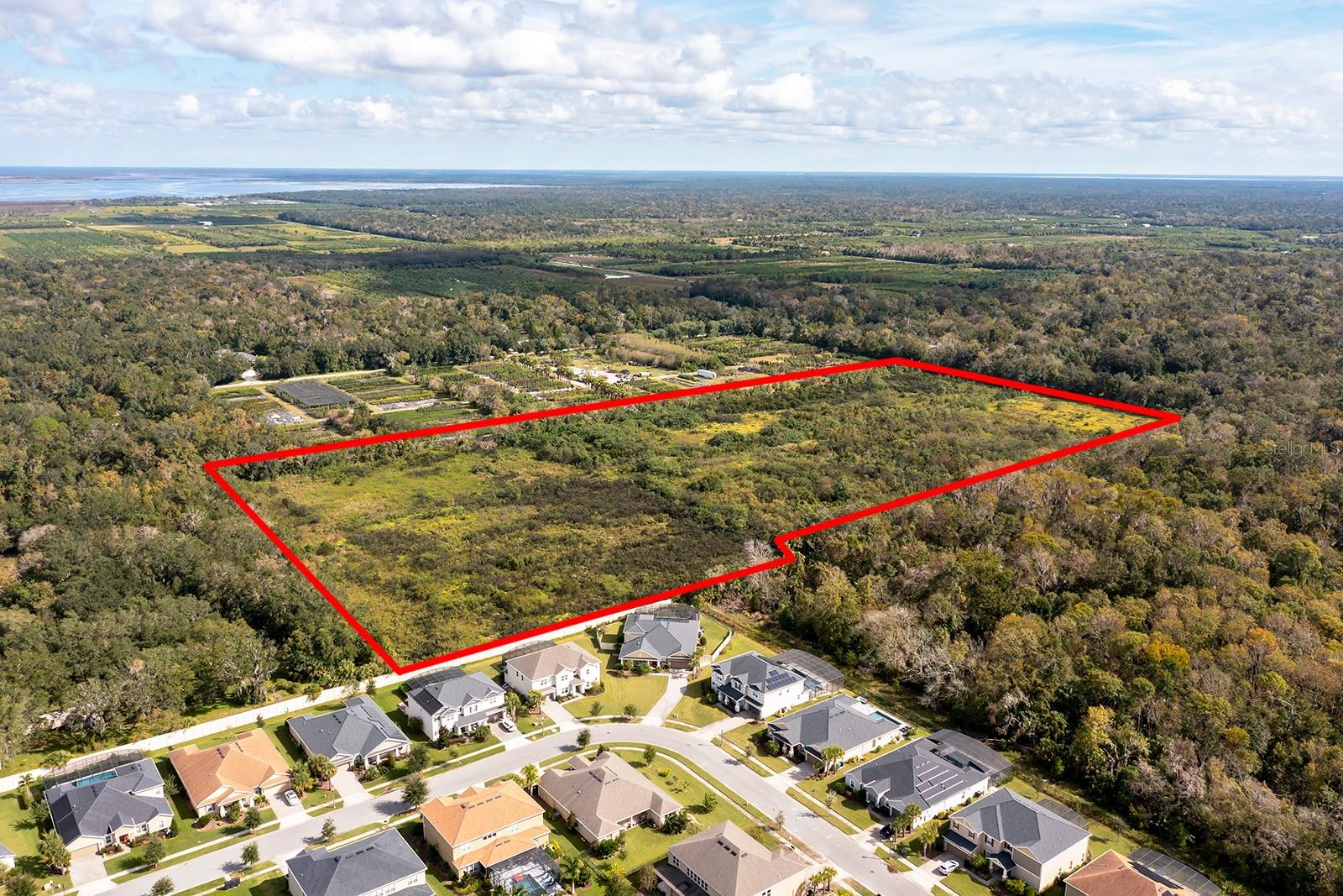 Opportunity awaits you with this incredible property which may be purchased with the adjoining parcels, totaling ±42.89 acres, all zoned A-5, and ingress/egress from Florida Ave. ±22 acres is mostly clear, raw land with Artesian wells feeding the property; This parcel is part of Transition Area Number 1, within the City of Oviedo and Seminole County Joint Planning Area, also known as the Future Oviedo Annexation Area. To the south, the community, Retreat at Lake Charm, borders this group of parcels and features an R-1 zoning while residing within the City of Oviedo. This helps the subject property to meet one of the primary planning elements when considered for annexation into the City of Oviedo, and potential for increased density. Oviedo has shown exceptional growth, named "Best Suburb to Raise a Family in the Orlando Area" and “50 Best Places to Live in America” by major publications. This city, of approximately 40,000 residents, has a median age of 36 and household incomes that are some of the highest in Central Florida. The area also boasts an exceptional educational system with A-Rated schools in addition to numerous recreational amenities just steps away. Listing agent will accompany all showings. Please do not approach the property without an appointment. Feel free to drive around the area at any time.