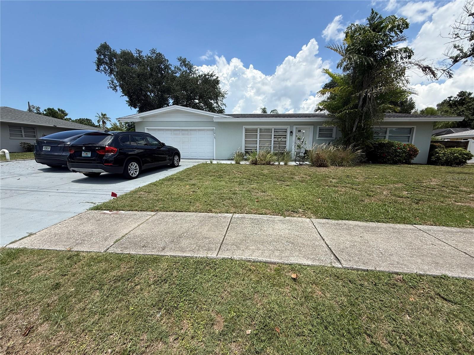 This beautiful property has granite countertops, shaker cabinets, a newer kitchen and bedroom has been totally remodeled about 6 years ago. It has brand new flooring. The air conditioning is about 7 years ago. There is nice rare brick pavers and patio with a large fenced in yard.
