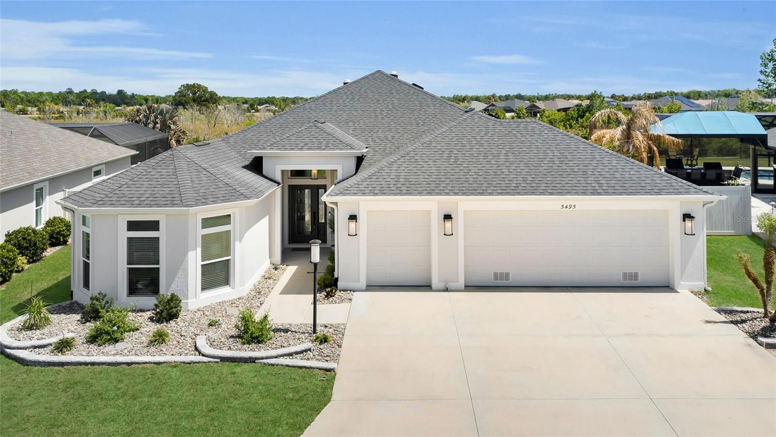 NO REAR NEIGHBORS!! Welcome to 5495 Hawkins Drive in the highly sought-after community of The Villages—a beautifully maintained 3-Bedroom 2-Bathroom home offering comfort, privacy, and scenic surroundings. This charming elegant Kitchen has quartz countertops, plenty of cabinetry, topped with elegant finishes and highlighted by TWO skylights above-filling the Kitchen and Livingroom with abundant natural light. The Tile floors flow through the open areas. This inviting residence backs up to a serene preserve, providing peaceful views and added privacy with no rear neighbors. Inside, you’ll find a spacious and thoughtfully designed open floor plan featuring three generously sized bedrooms and the only rooms with carpet. A bright and open living area, and a well-appointed kitchen ideal for both everyday living and entertaining.Large windows fill the home with natural light while showcasing the tranquil natural backdrop. The primary suite offers a relaxing retreat with ample space and a private en-suite bath. Step outside to the Lanai that faces East and enjoy your morning coffee or evening unwind in the backyard, where nature and quiet surroundings create the perfect setting. The Roof has the Architectural Shingles, the Garage has a whole house exhaust fan, also others features the Home has full gutters, downspouts, and french drains. There is an ampicable room for a FULL SIZE POOL. Located in The Villages, this Home offers access to a vibrant, amenity-rich lifestyle including golf courses, recreation centers, dining, shopping, and countless social activities. Furniture & Golf Cart are Negotiable.